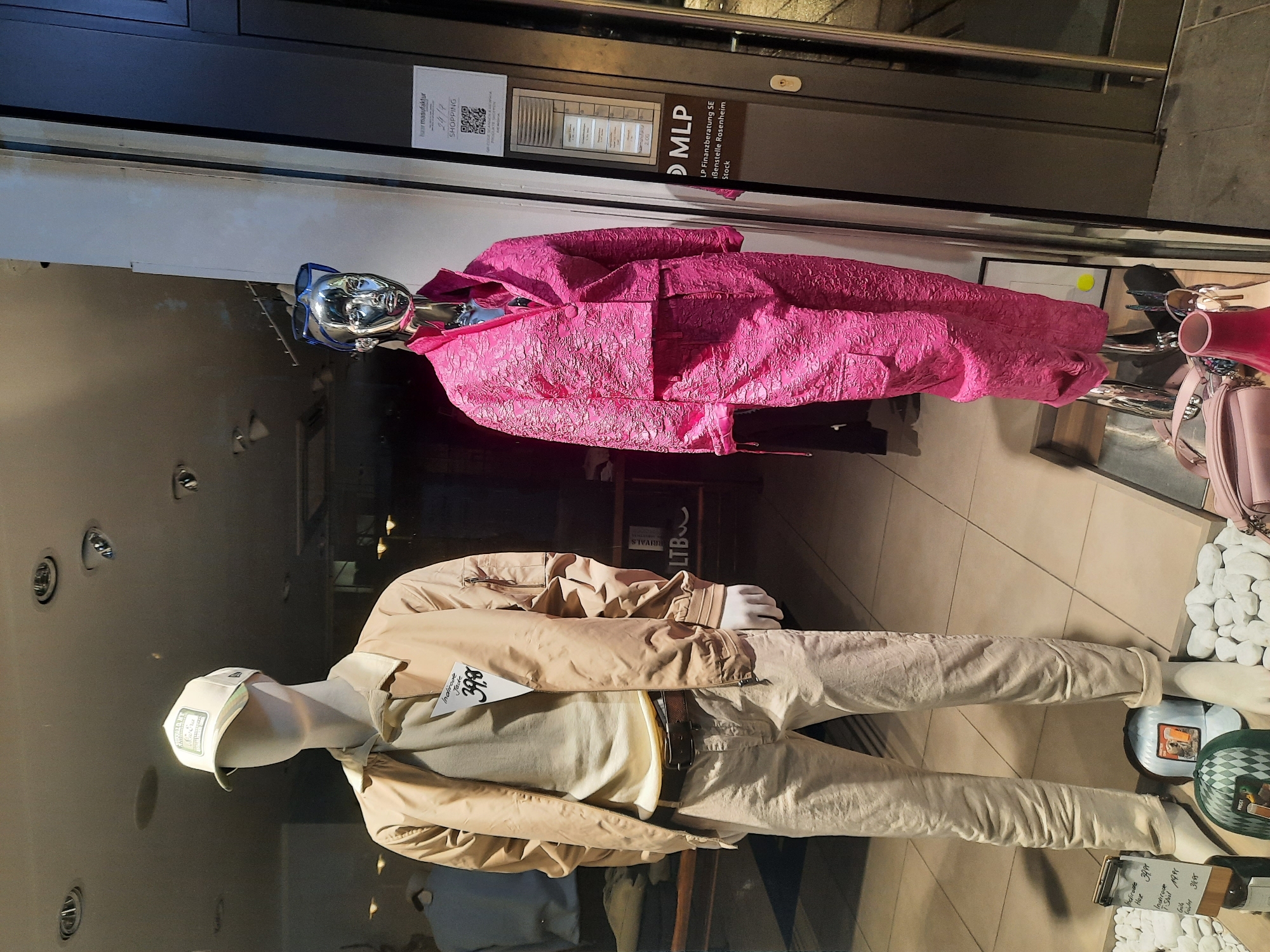 Evening window shopping and fireworks documented in Rosenheim, Germany