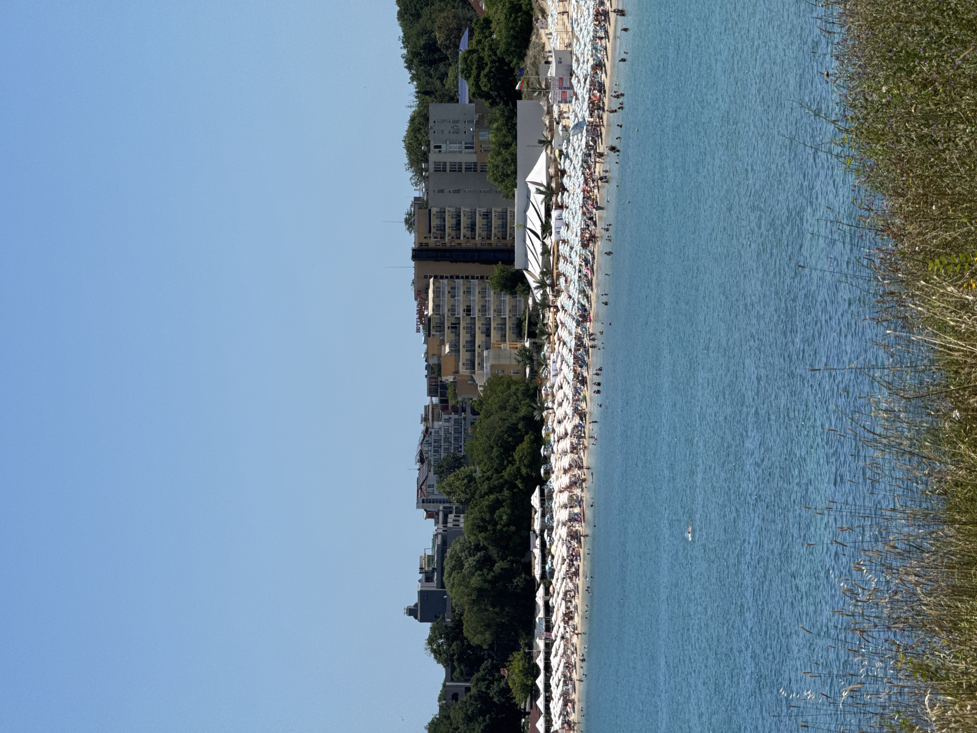 Packed summer beach day on Bulgaria's Black Sea coast