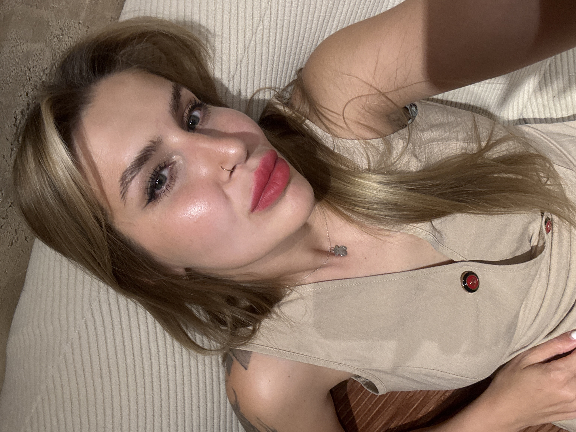 Woman in beige dress observed resting in Bijela, Montenegro