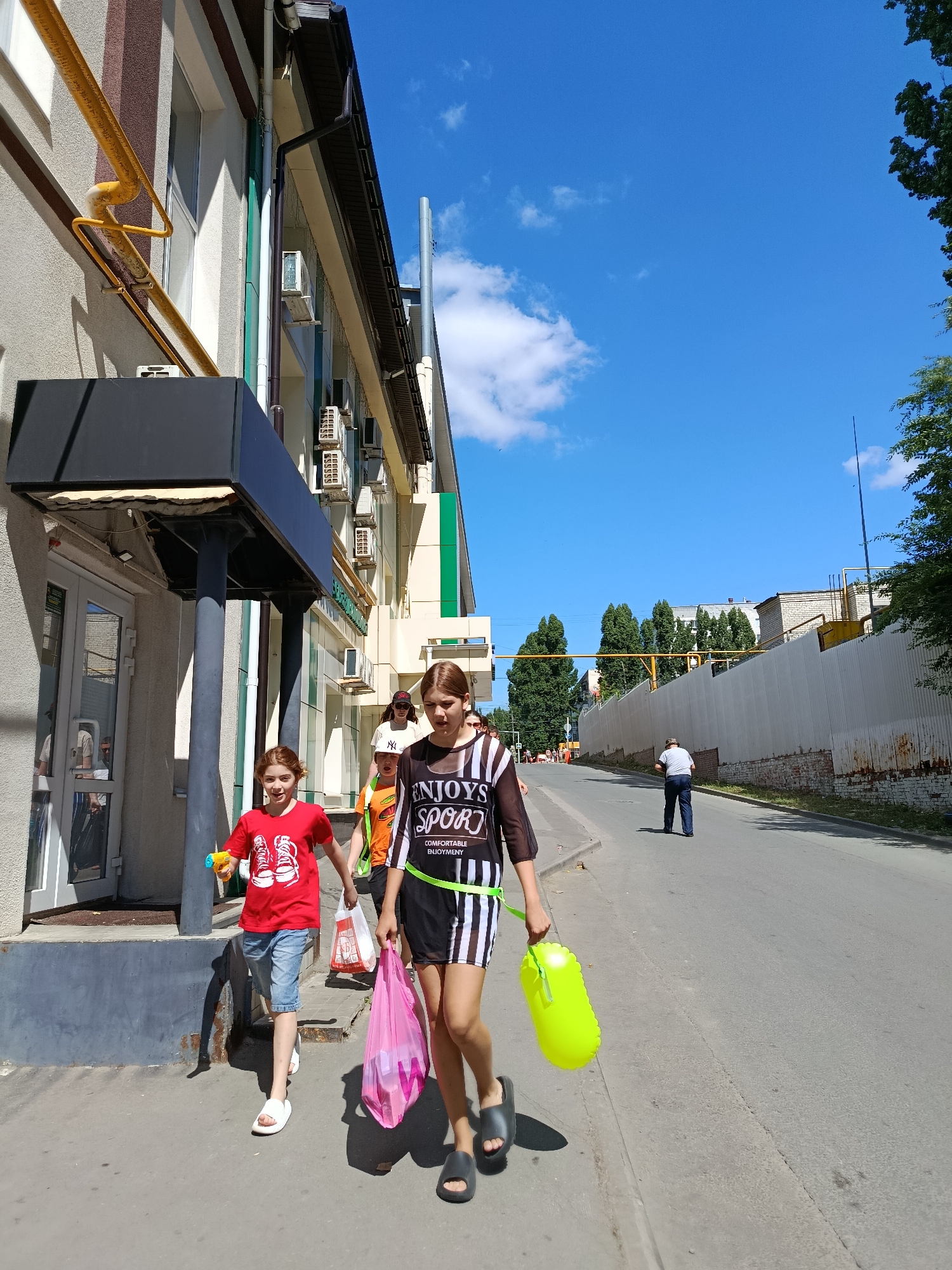 Saratov on a sunny summer morning, streets and waterfront alive