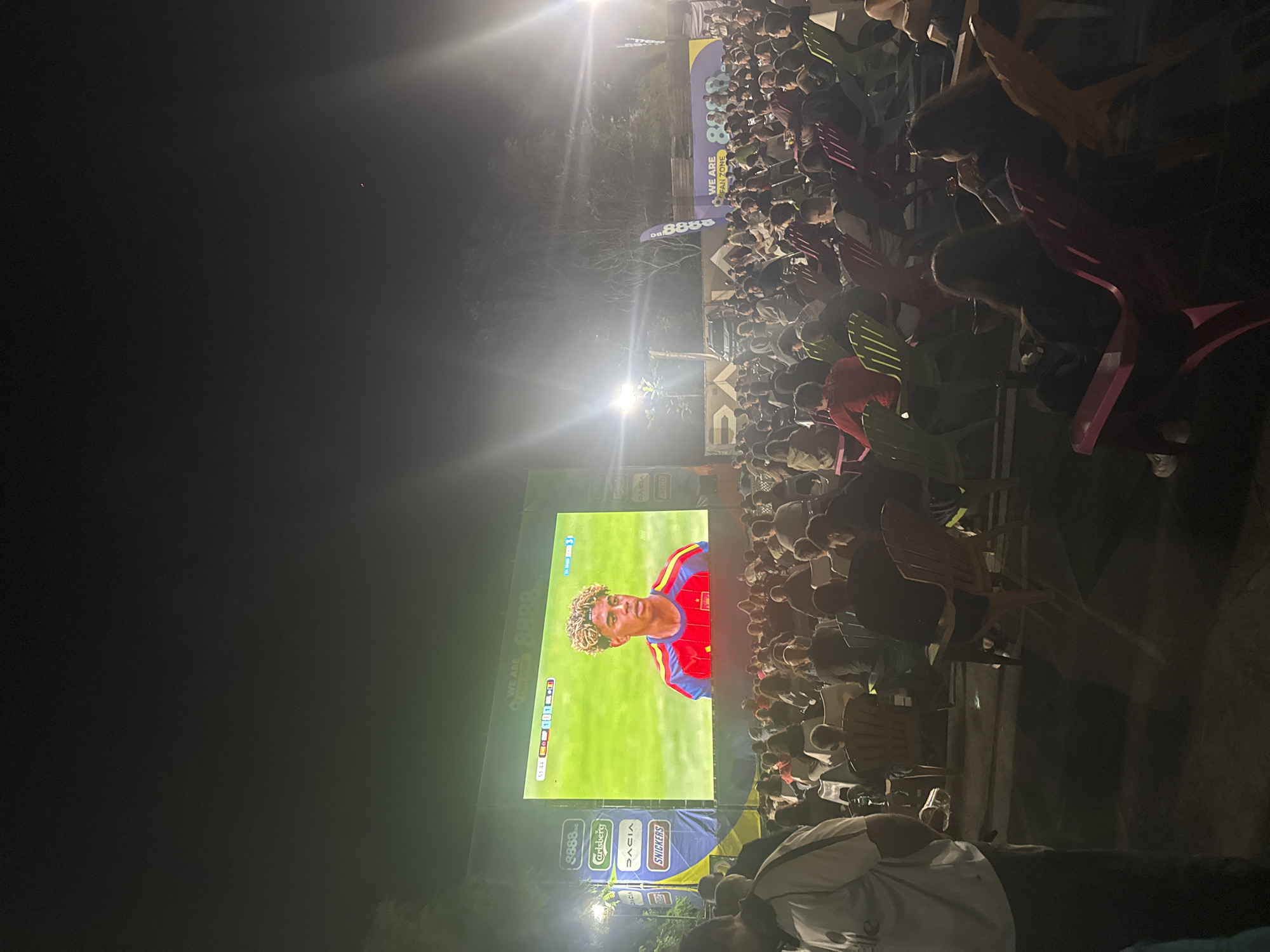 Sofia crowd gathers for outdoor soccer screening on summer night