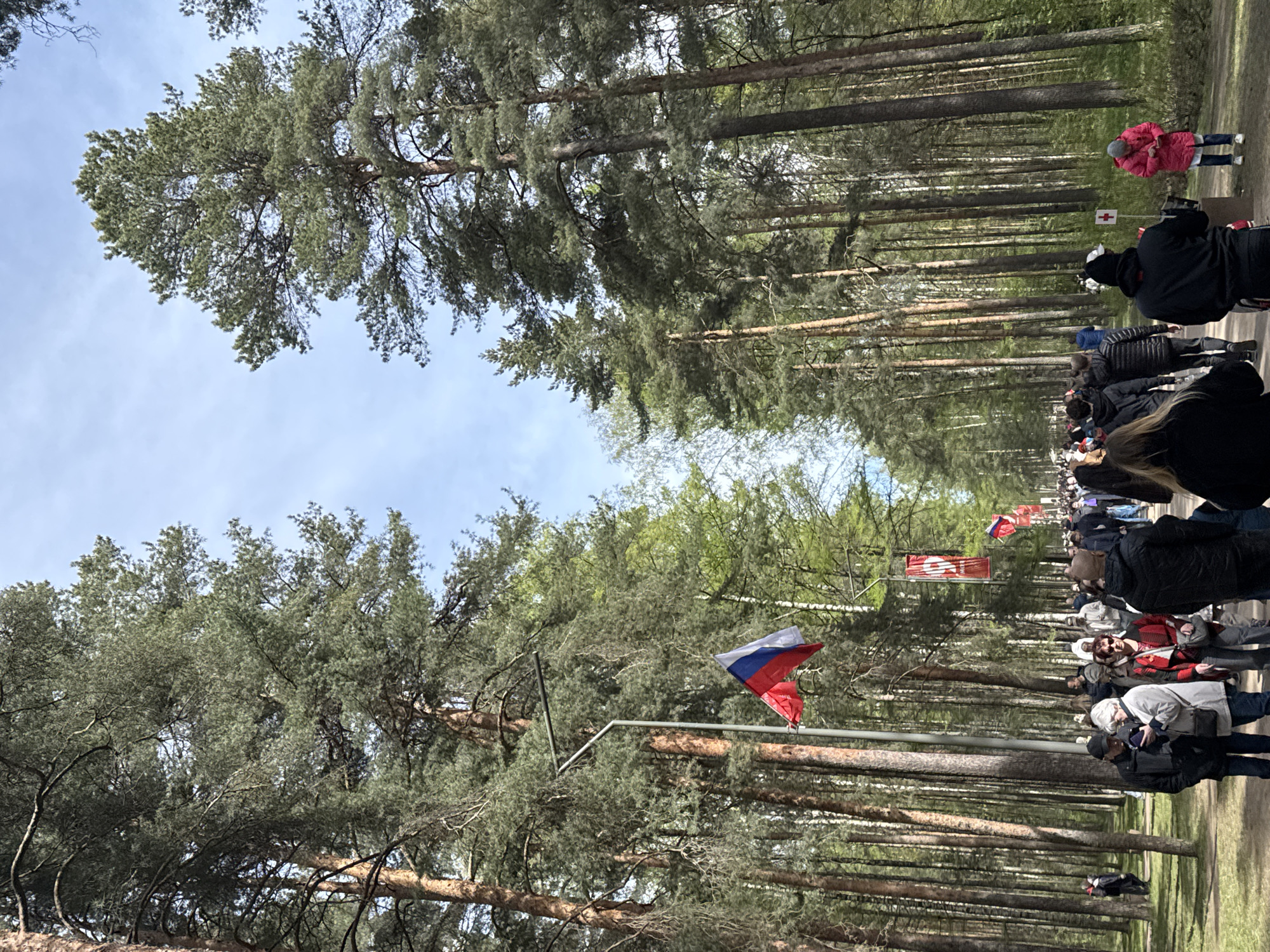 Forest procession with Russian flags draws crowd in Saint Petersburg