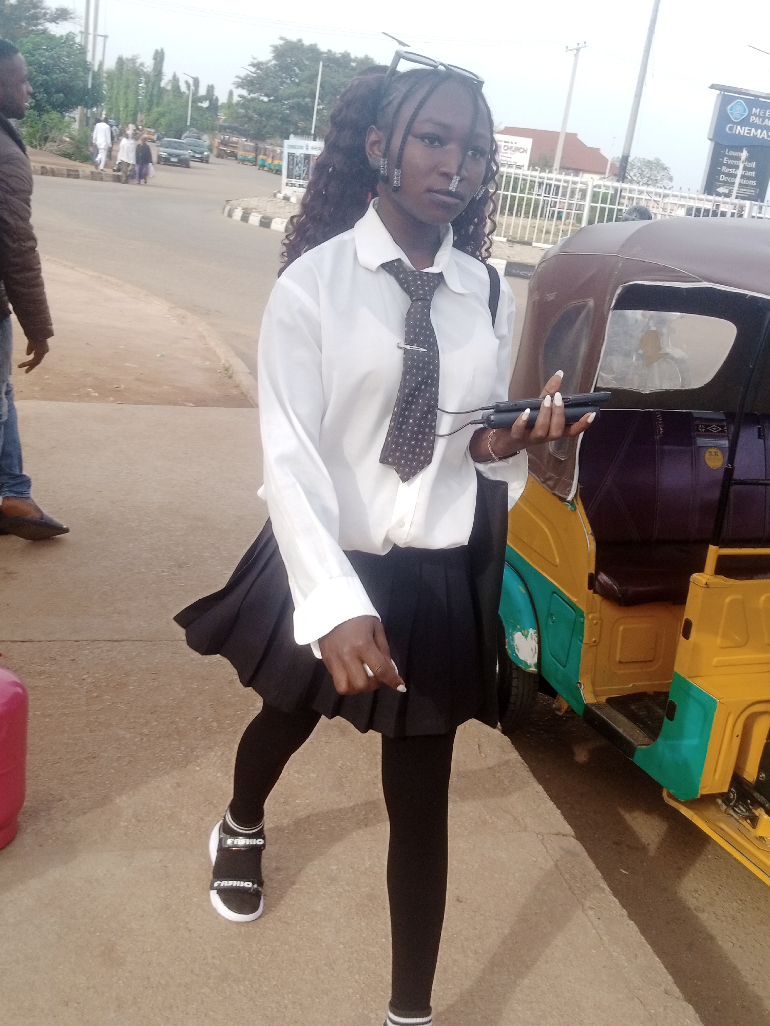 Morning street scenes across two neighborhoods in Nigeria