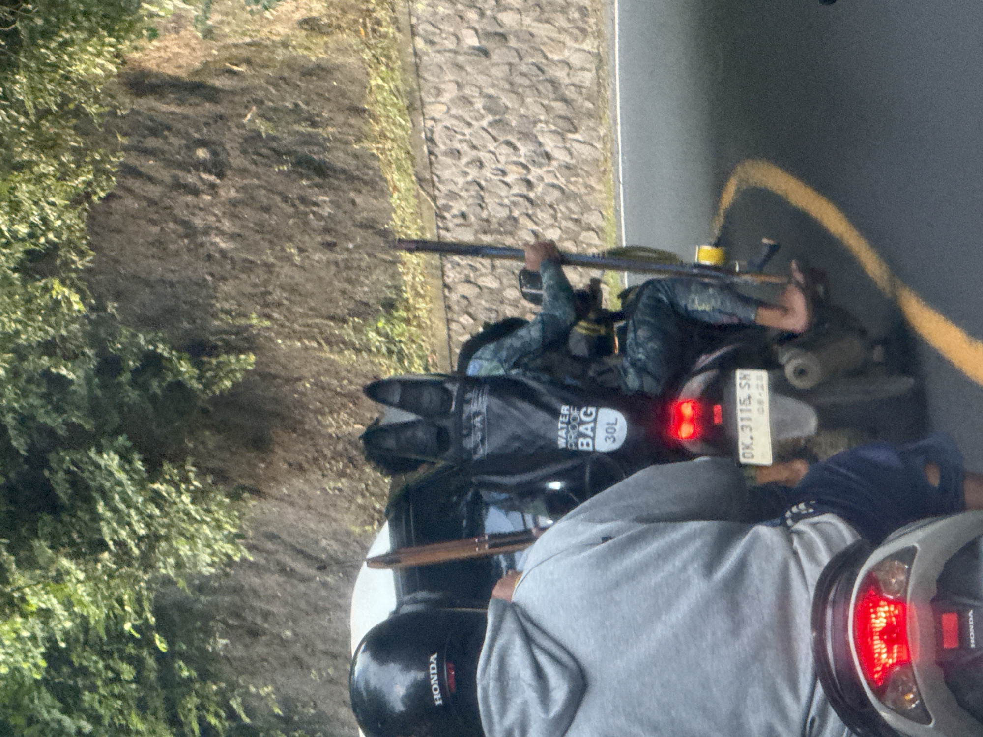 Motorcyclist spotted with waterproof gear on Bugbug road