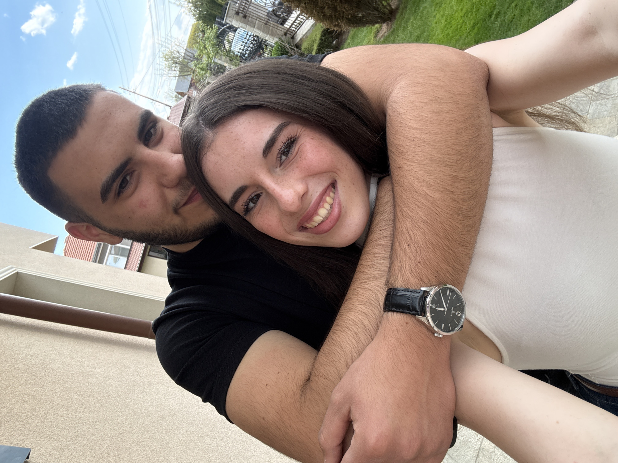 Young couple embraces outdoors in Trud, Bulgaria