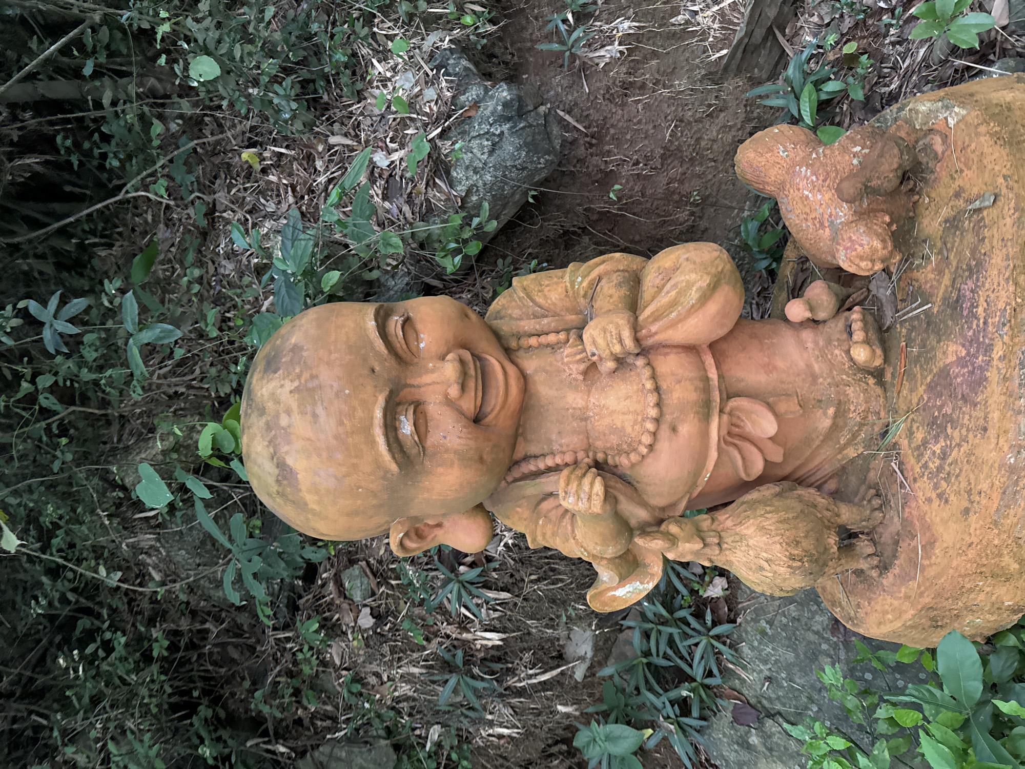 Visitors document Buddhist statues during Vesak temple tour Vietnam
