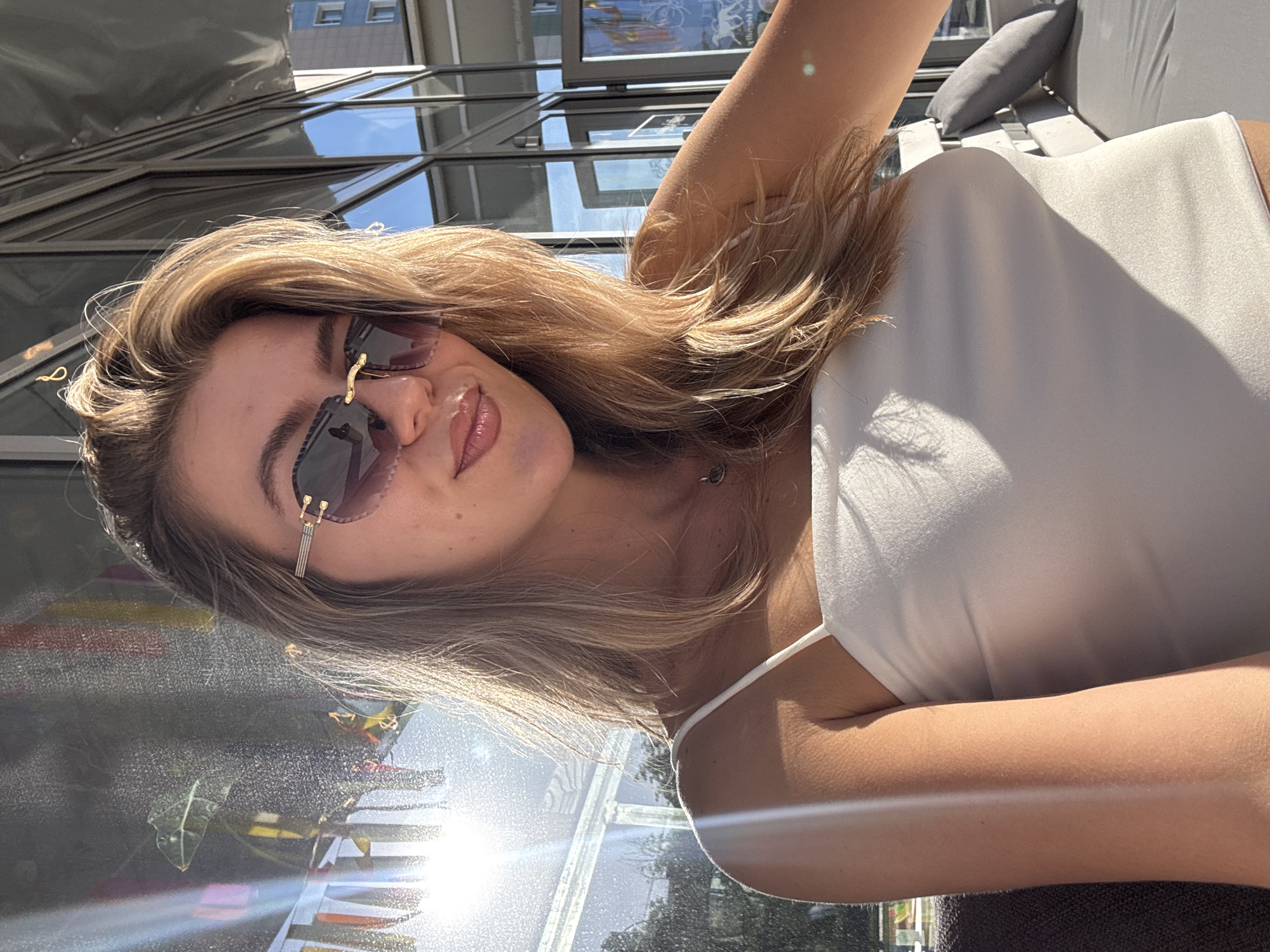 Woman documents day of travel through urban locations and airport
