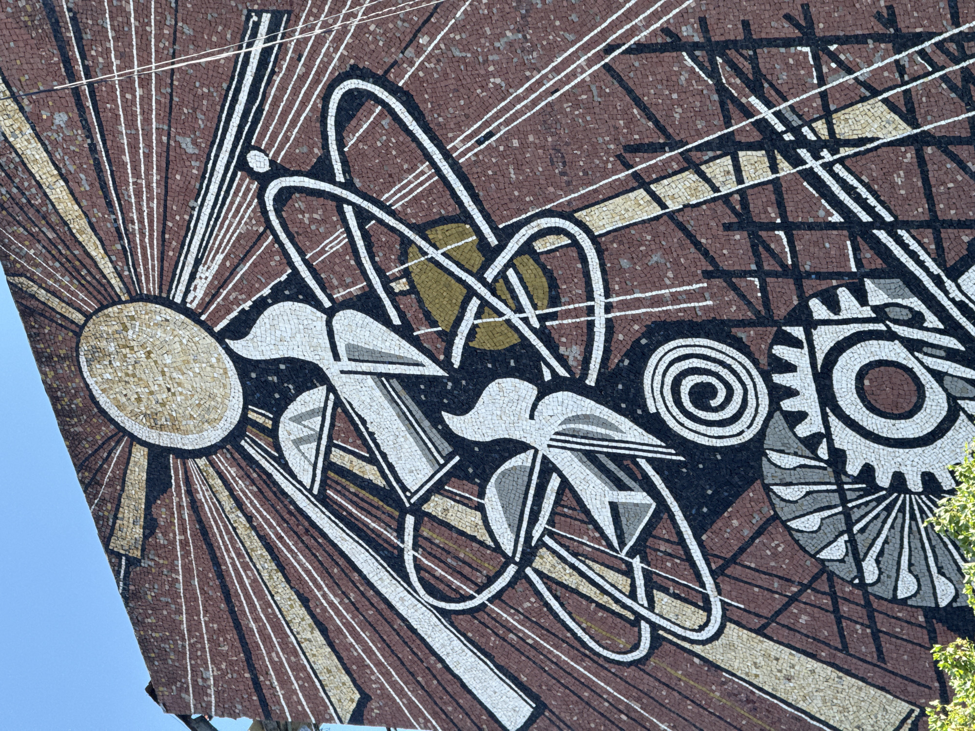 Bold Soviet-era style mosaic mural on a Lovech building wall