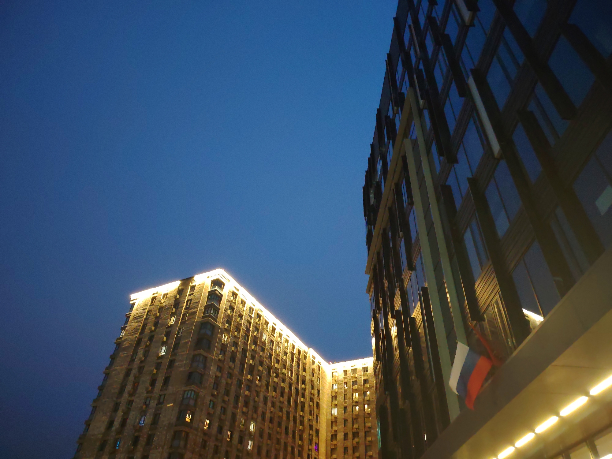 Evening building lights across Moscow area neighborhoods