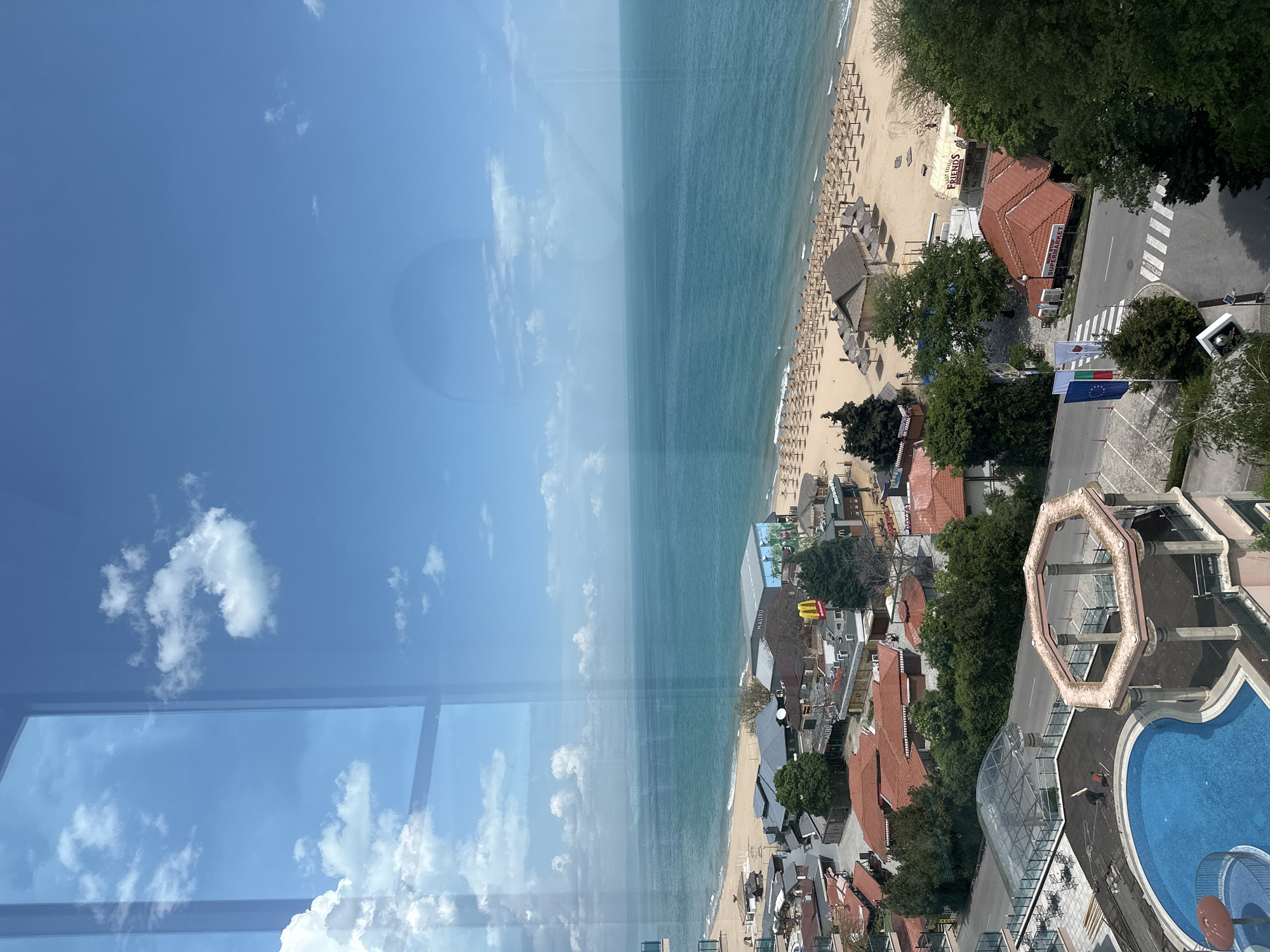 Golden Sands beach resort documented from aerial and interior perspectives