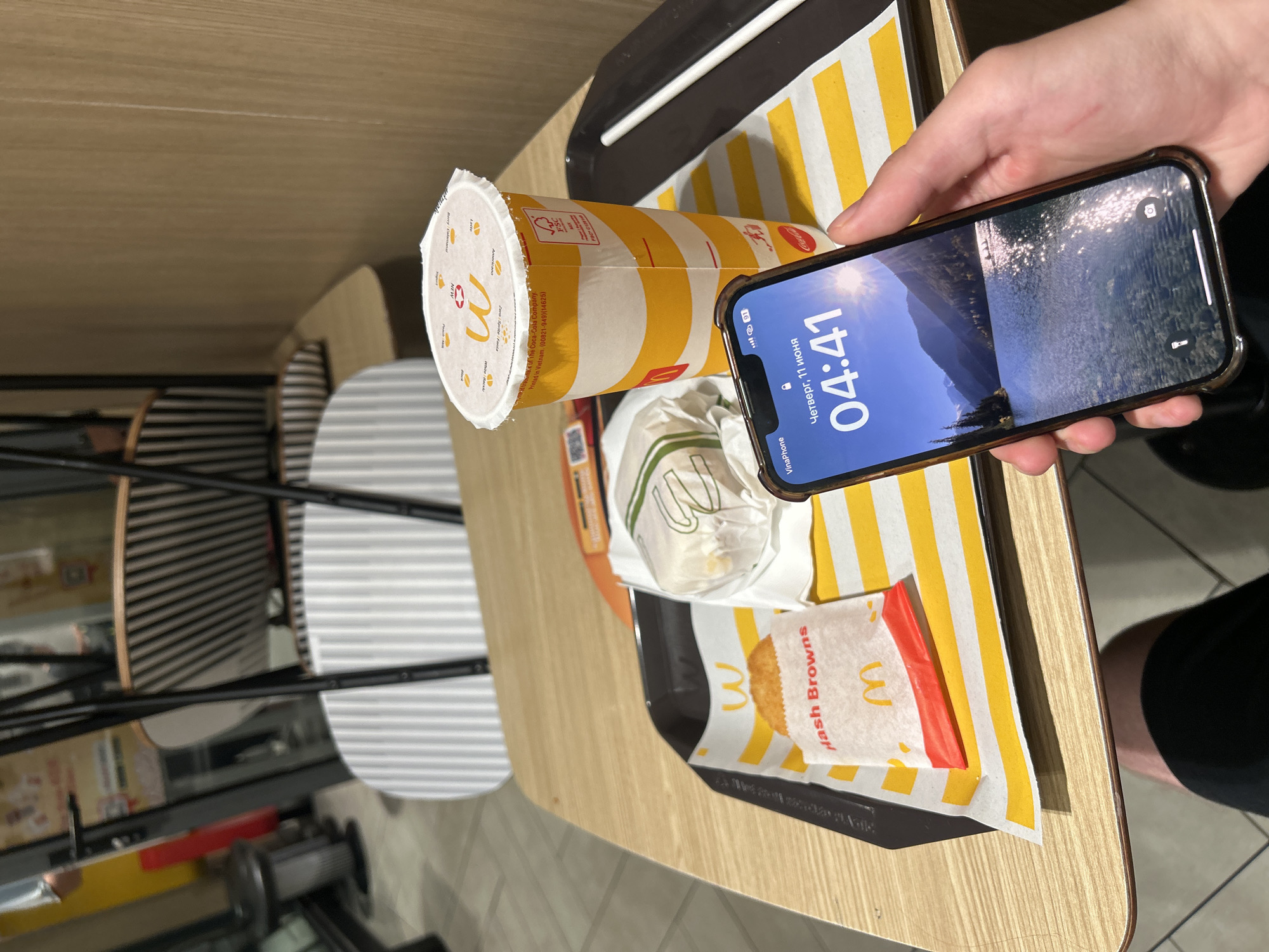 Young person documents McDonald's dinner experience in Thủ Đức