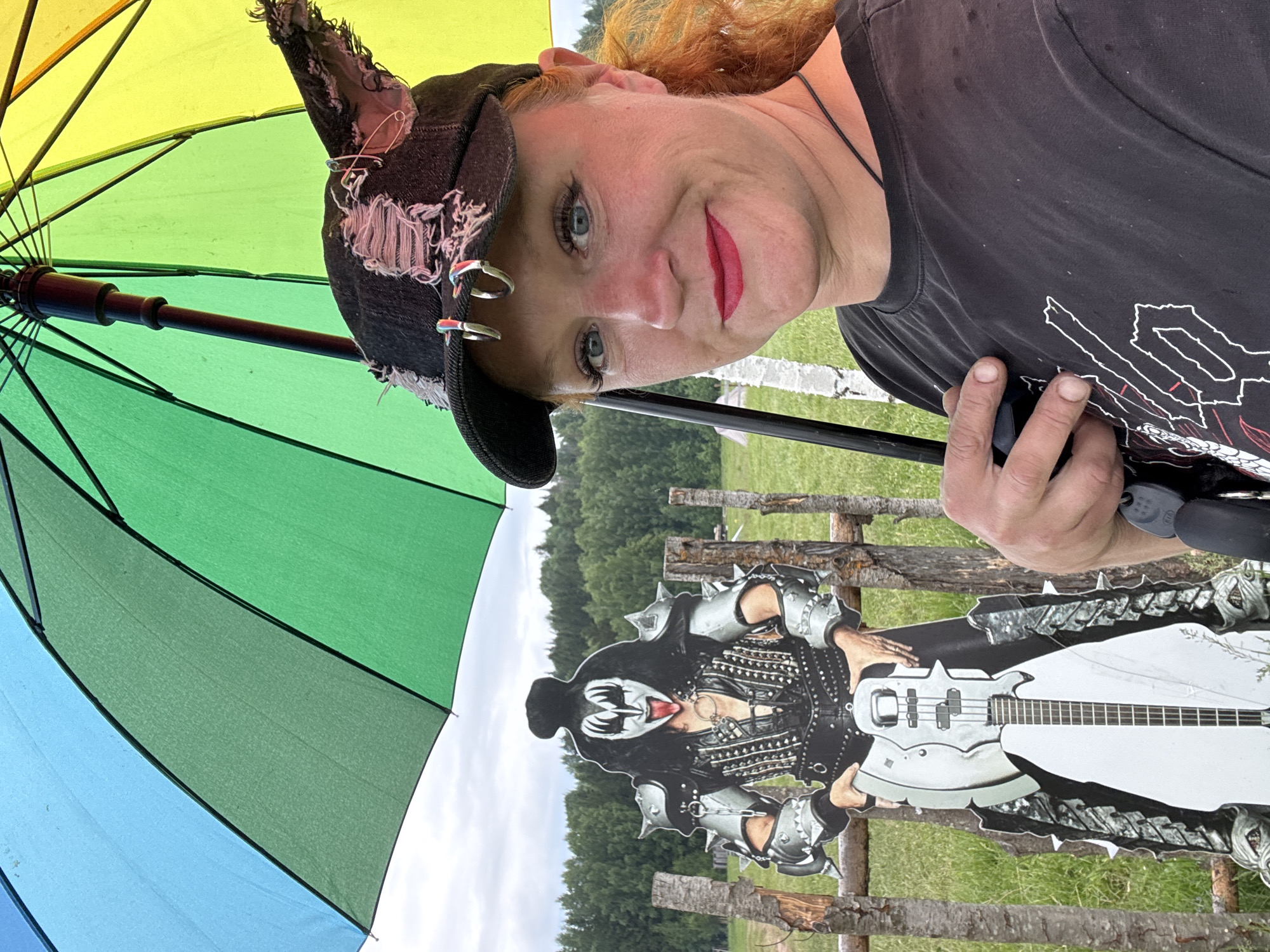 Woman and KISS cutout photographed in Russian village