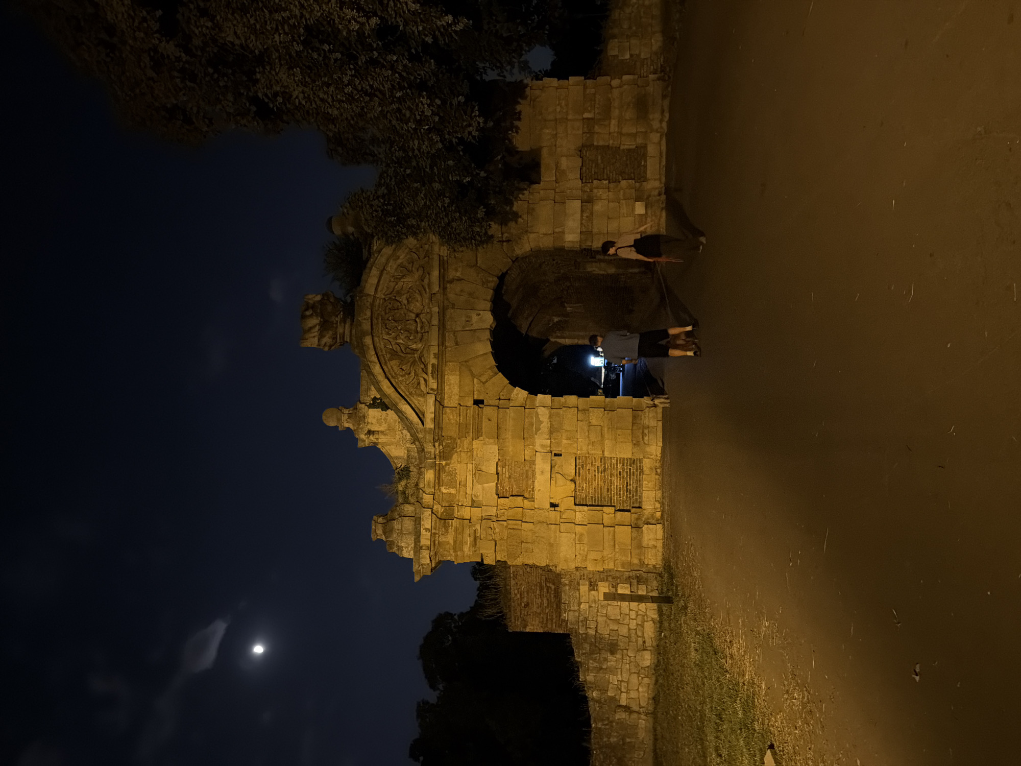 Belgrade Fortress at night, walls lit and paths quiet
