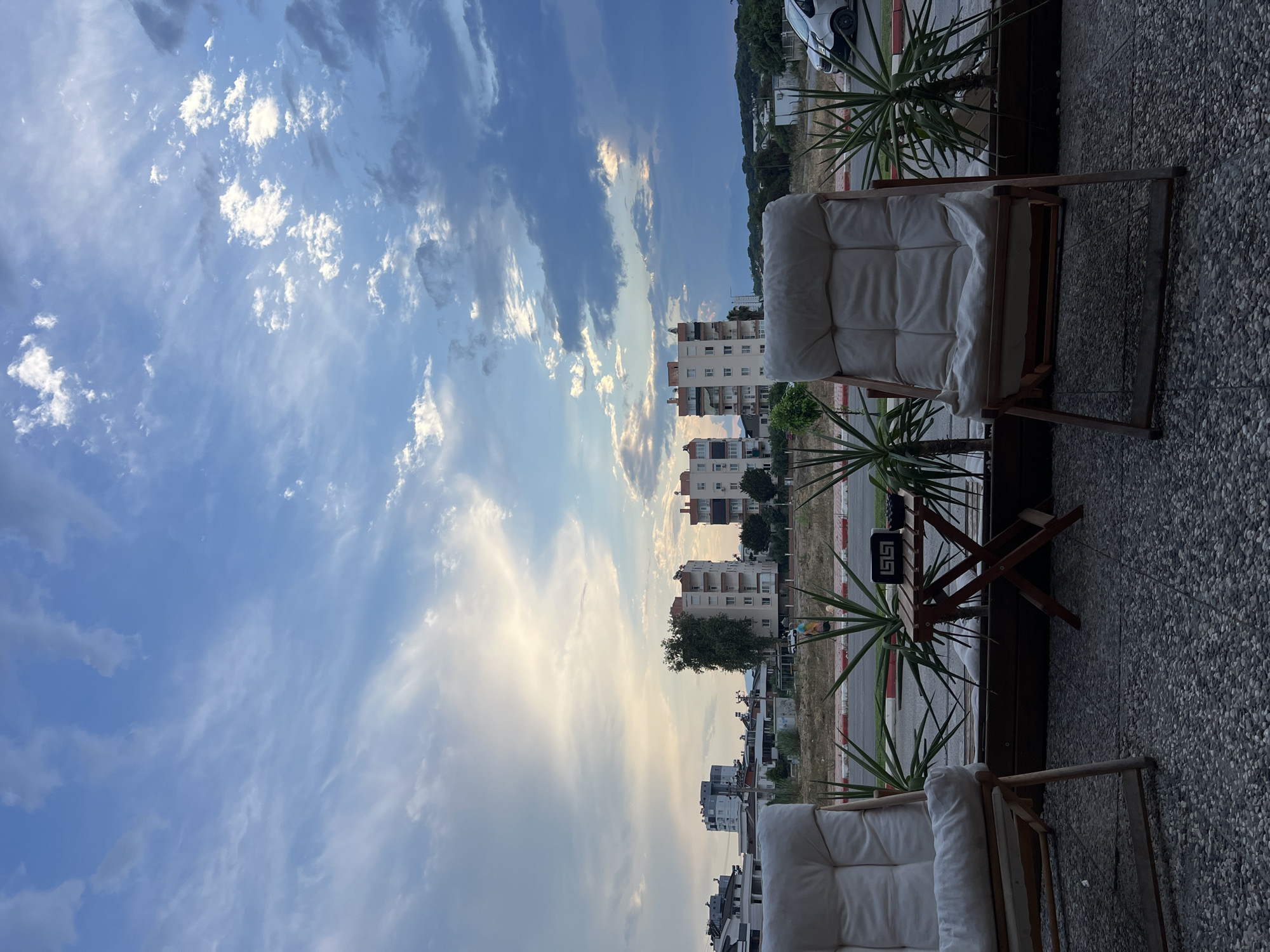 Antalya afternoon winding down: minarets, cloudy skies, and coffee