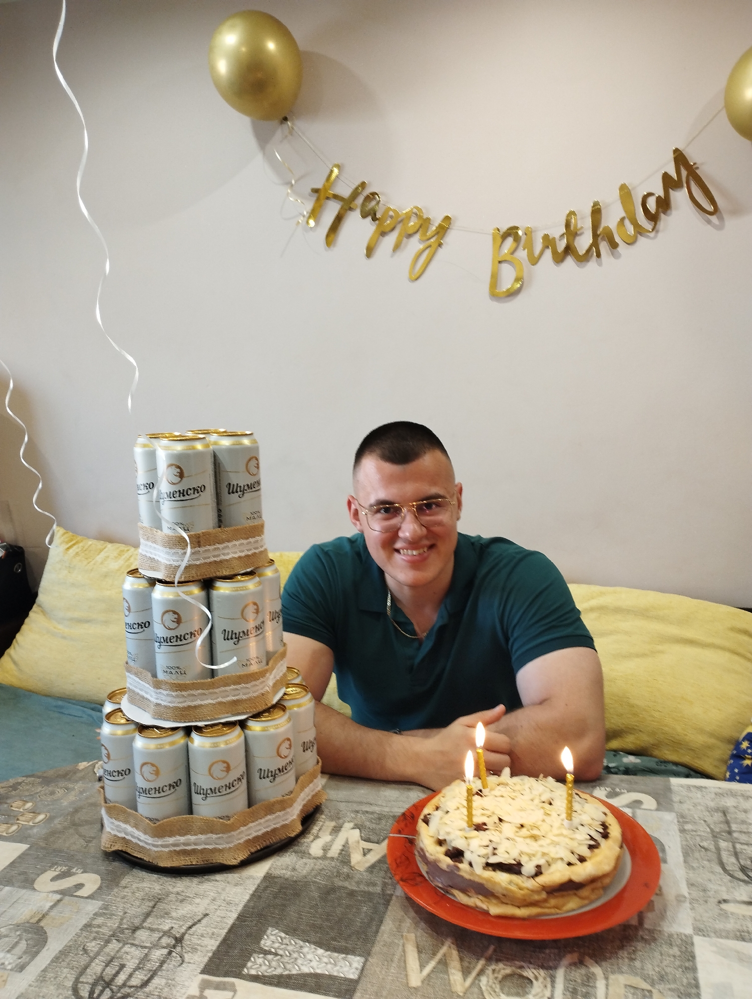 Man celebrates at unknown indoor location