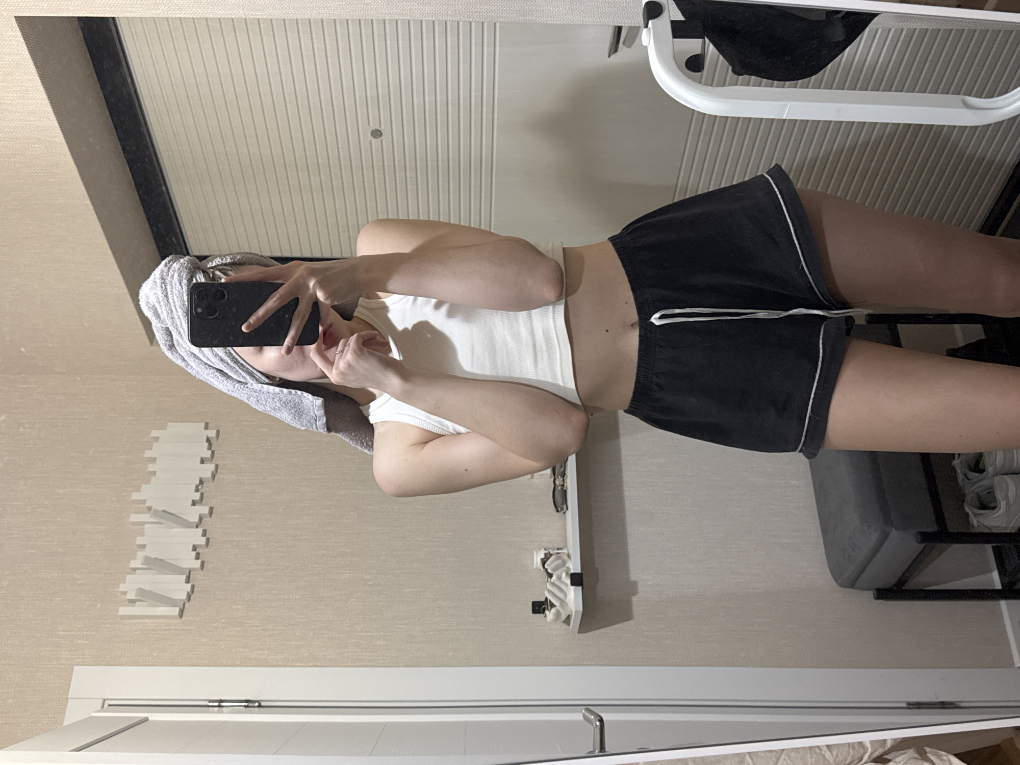 Woman takes kitchen selfies while cooking in Perm apartment