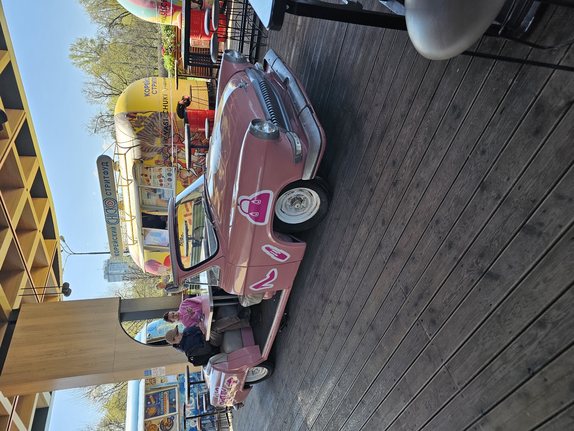 Moscow morning: vintage car restaurant, formal statue documented