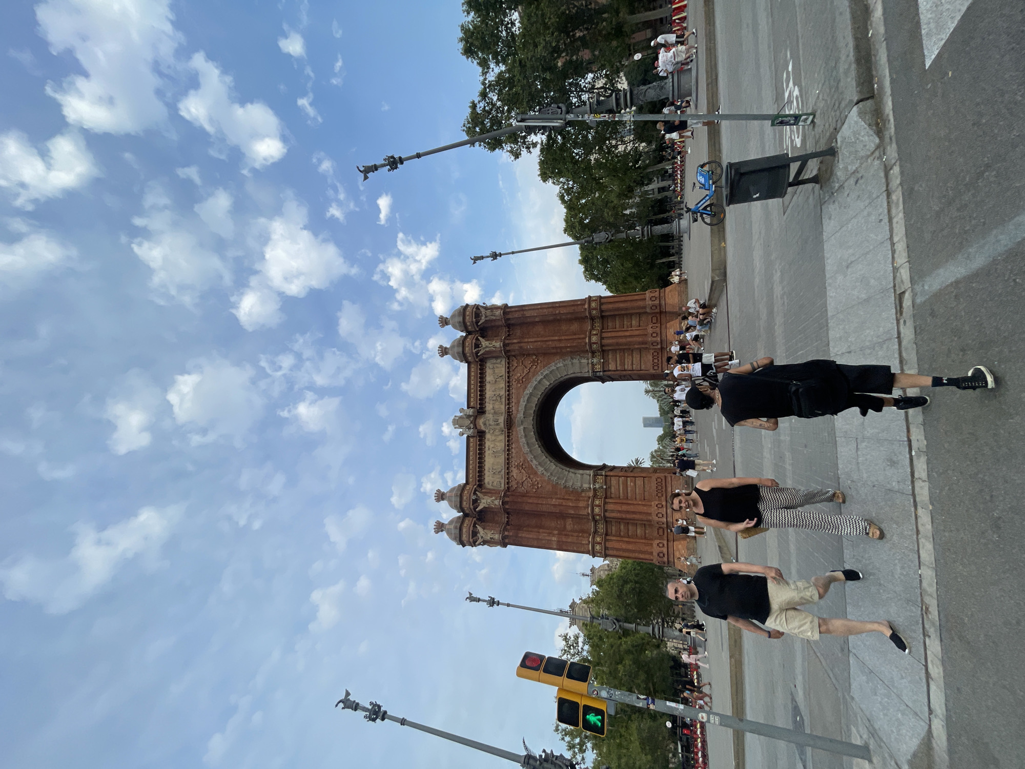 Crowd with flags assembles near Arc de Triomf, Barcelona