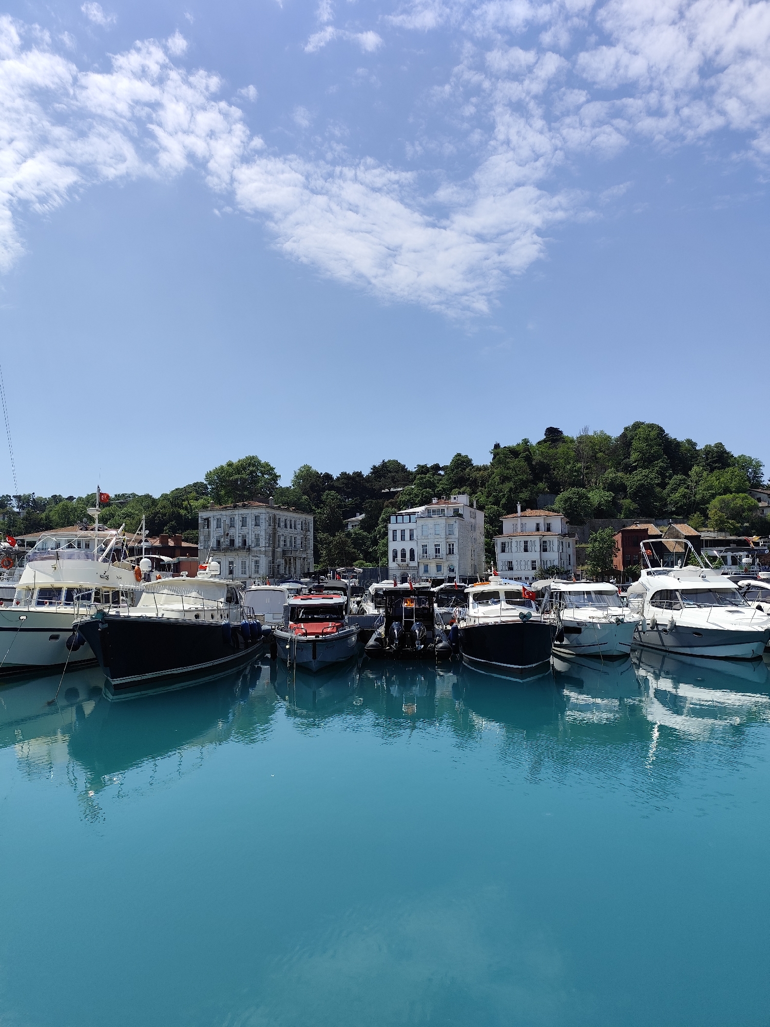 Peaceful morning at Sarıyer marina under clear Turkish skies