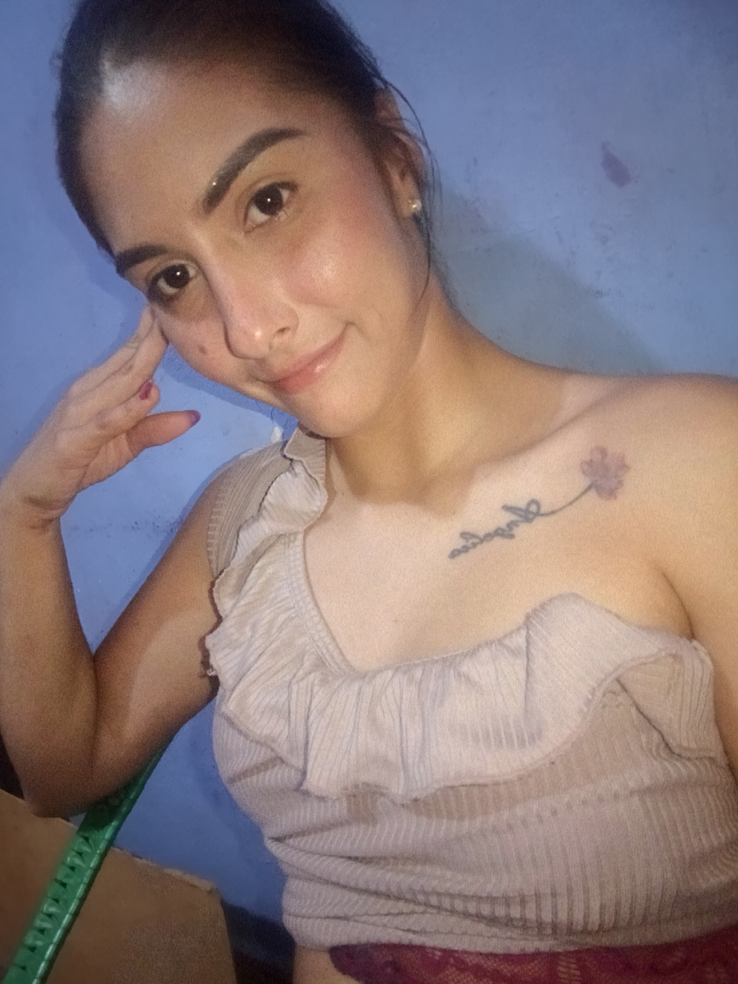 Woman takes multiple selfies during early morning photo session