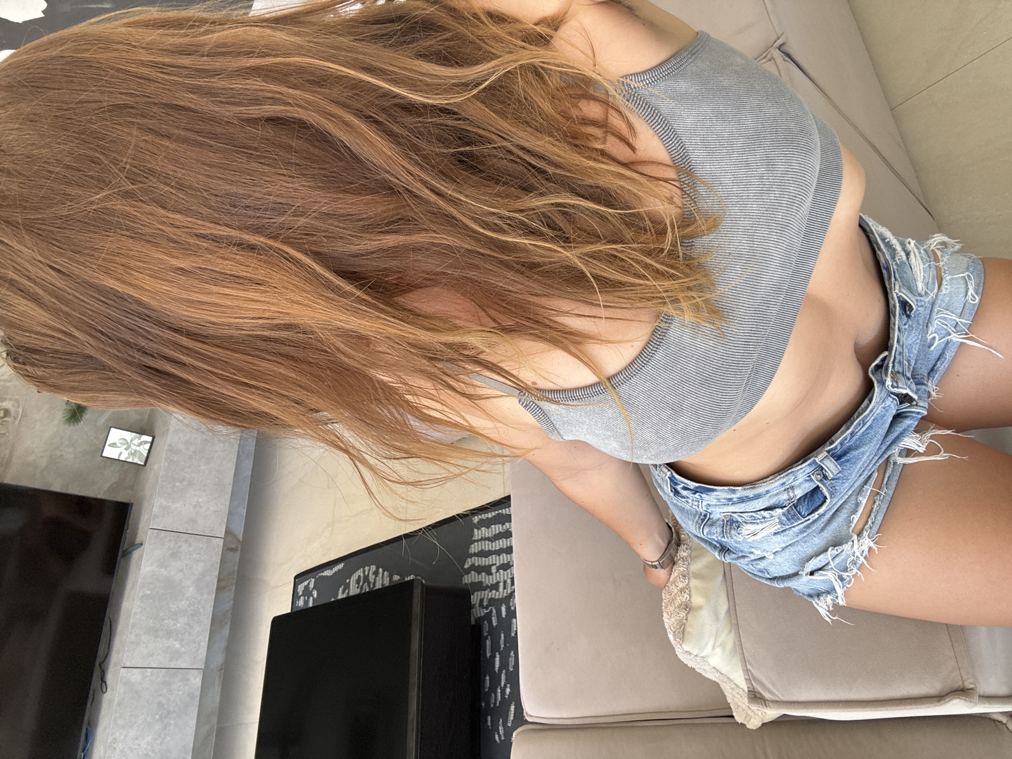 Mirror selfies and couch shots from a single indoor session