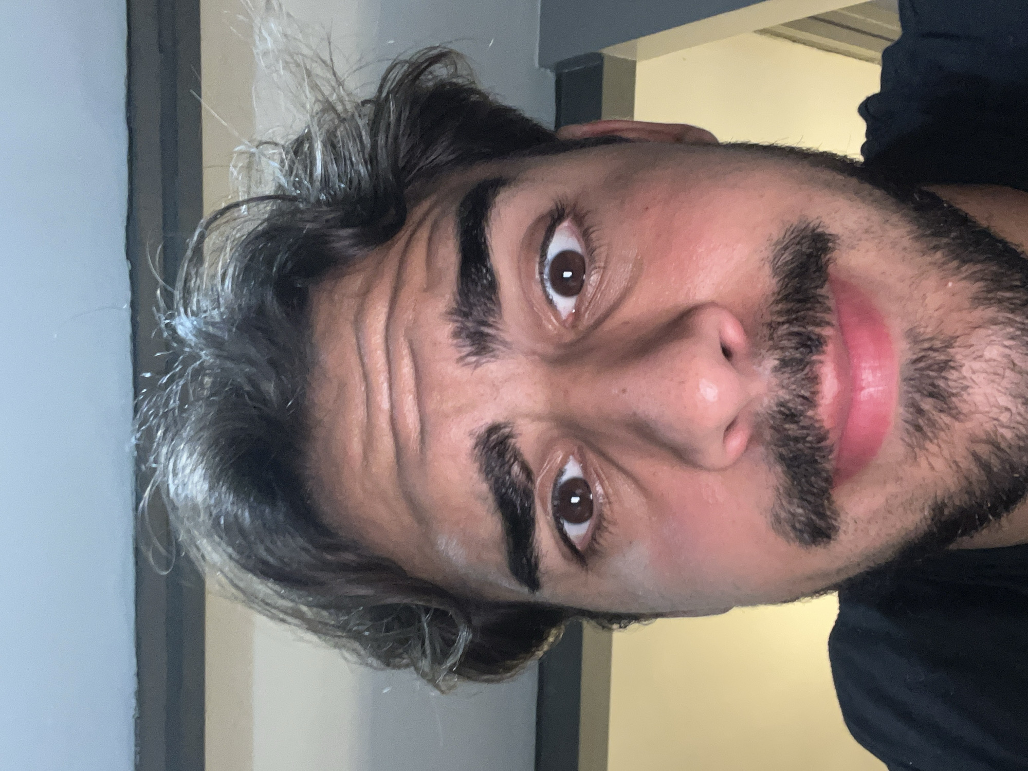 Man photographed in close-up portraits in Avellaneda