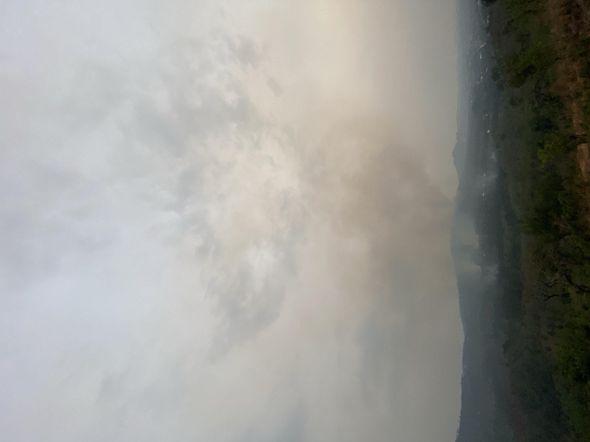 Smoke from hillside fire reduces visibility in Nigerian mountains