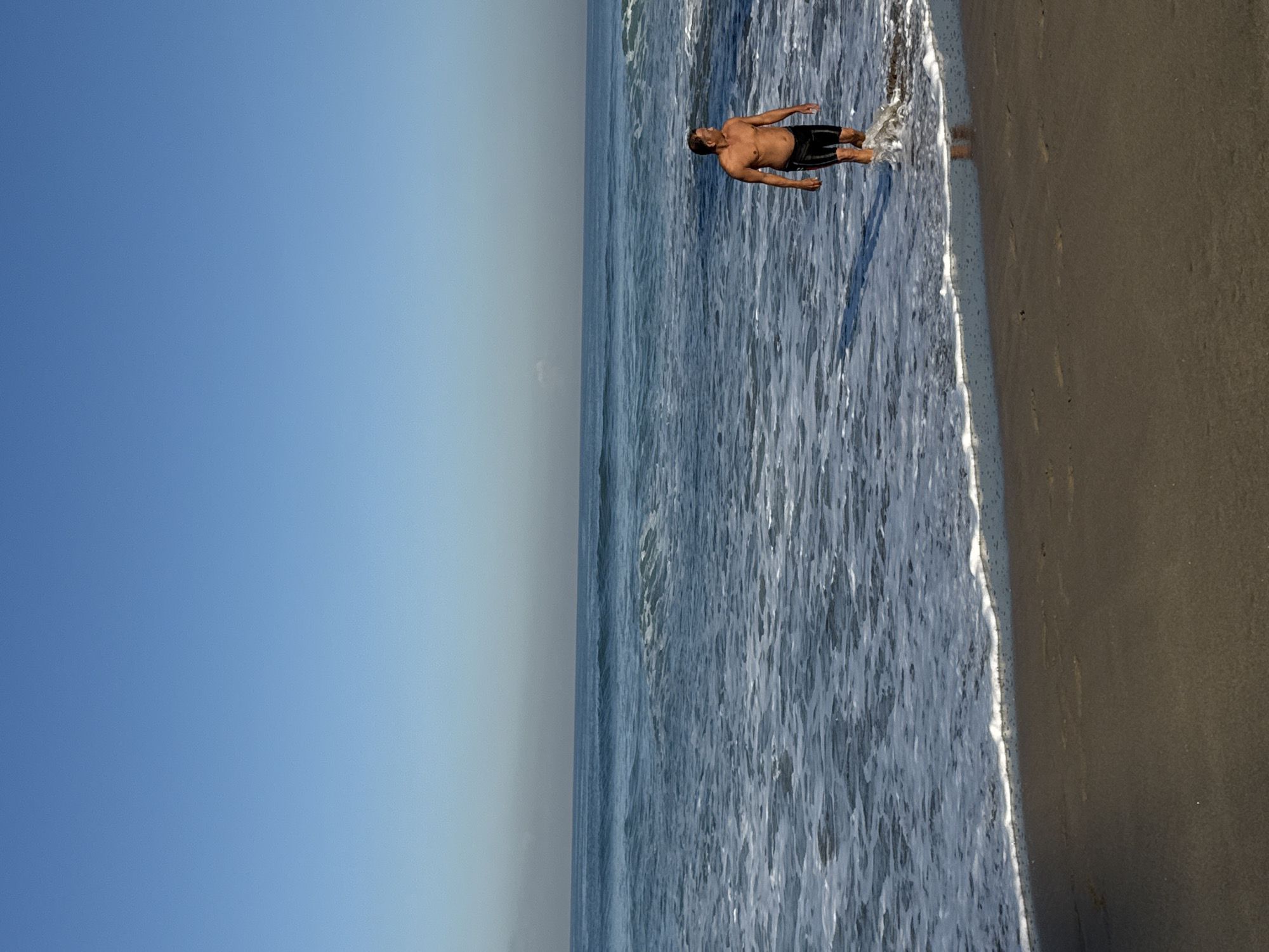 Ordinary beach day documented in Kuta, Indonesia tourist area