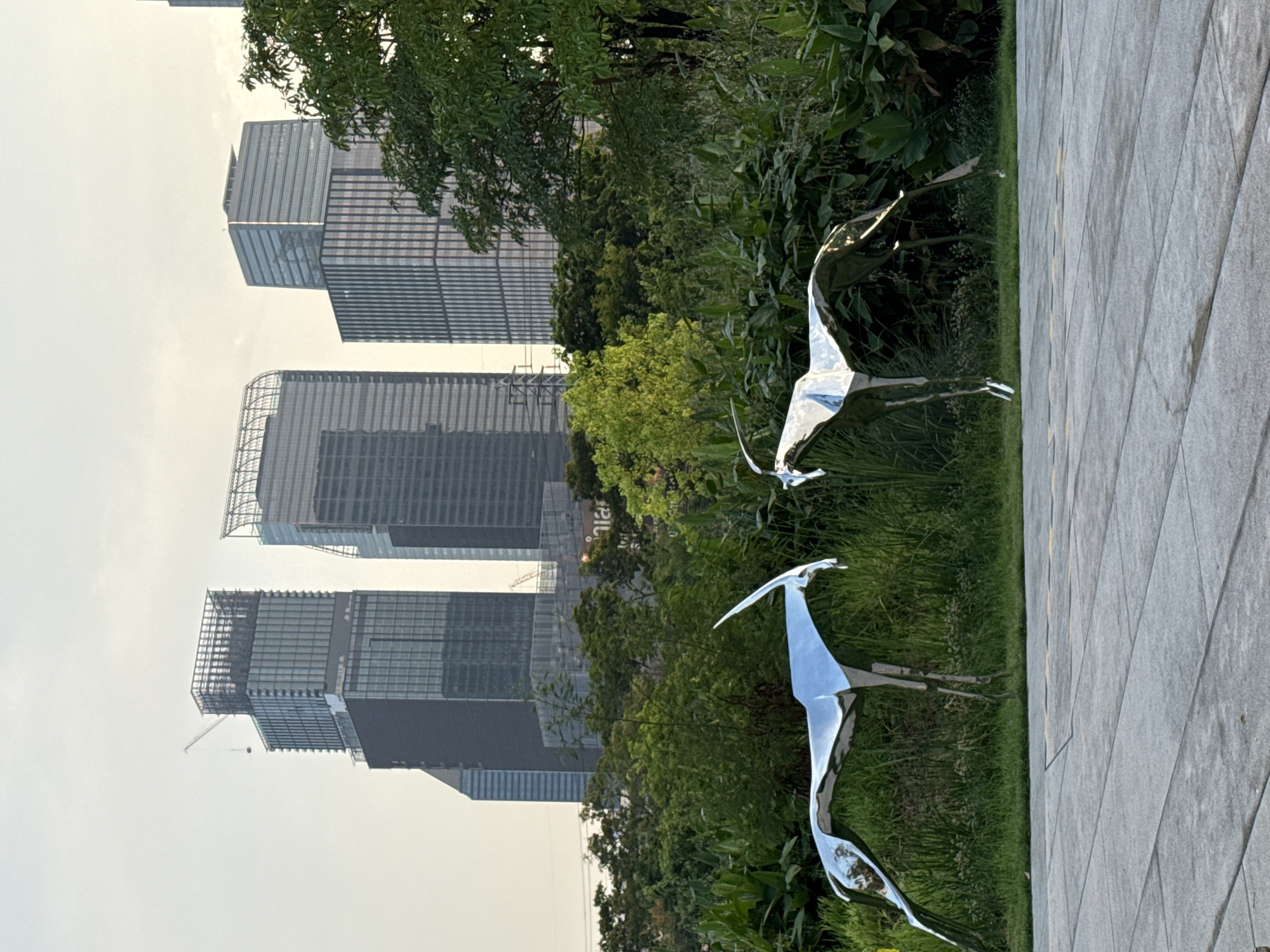 Morning scenes captured at Bangkok urban park with skyline