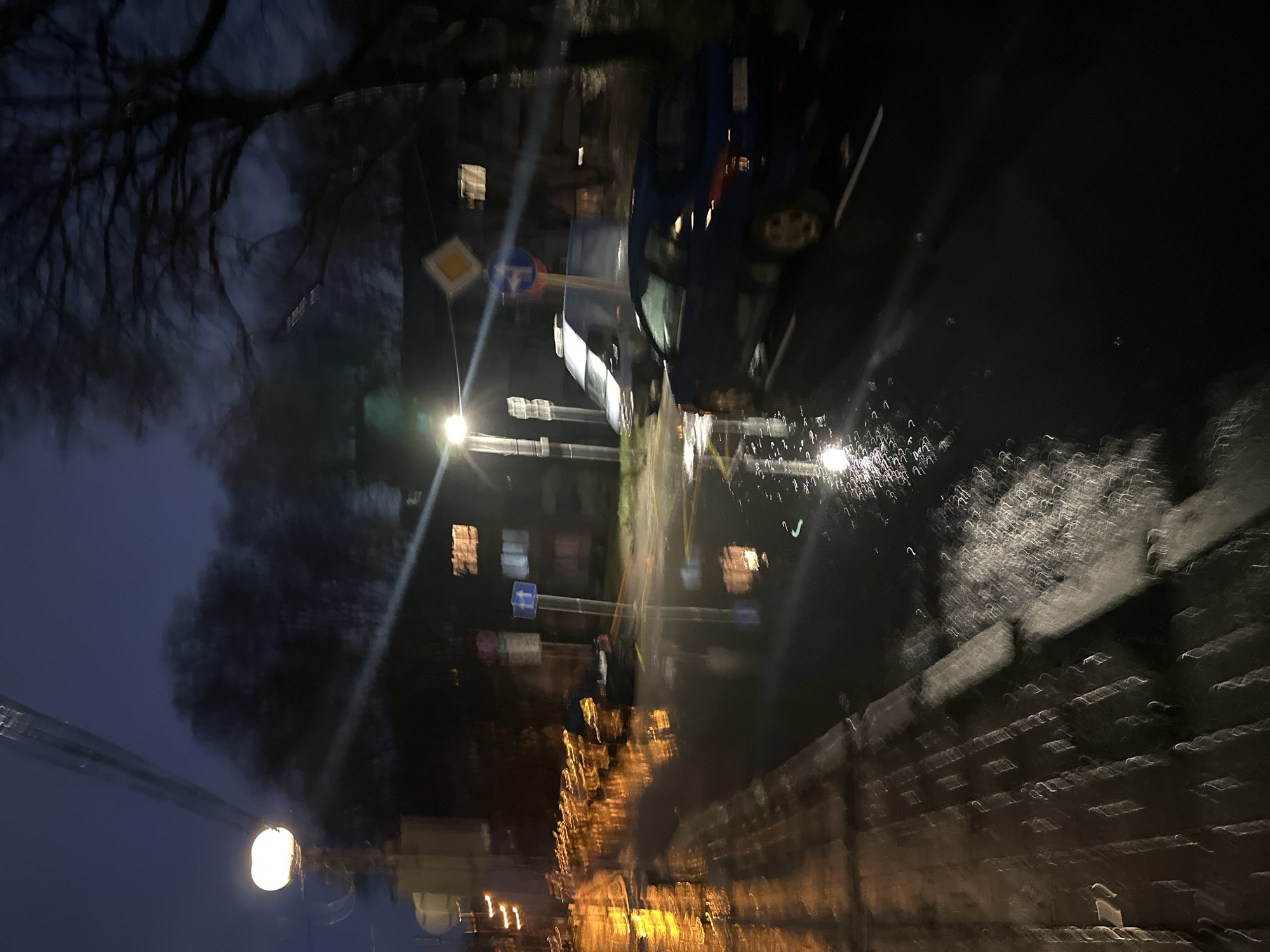 Rainy night street scene captured in Varna, Bulgaria
