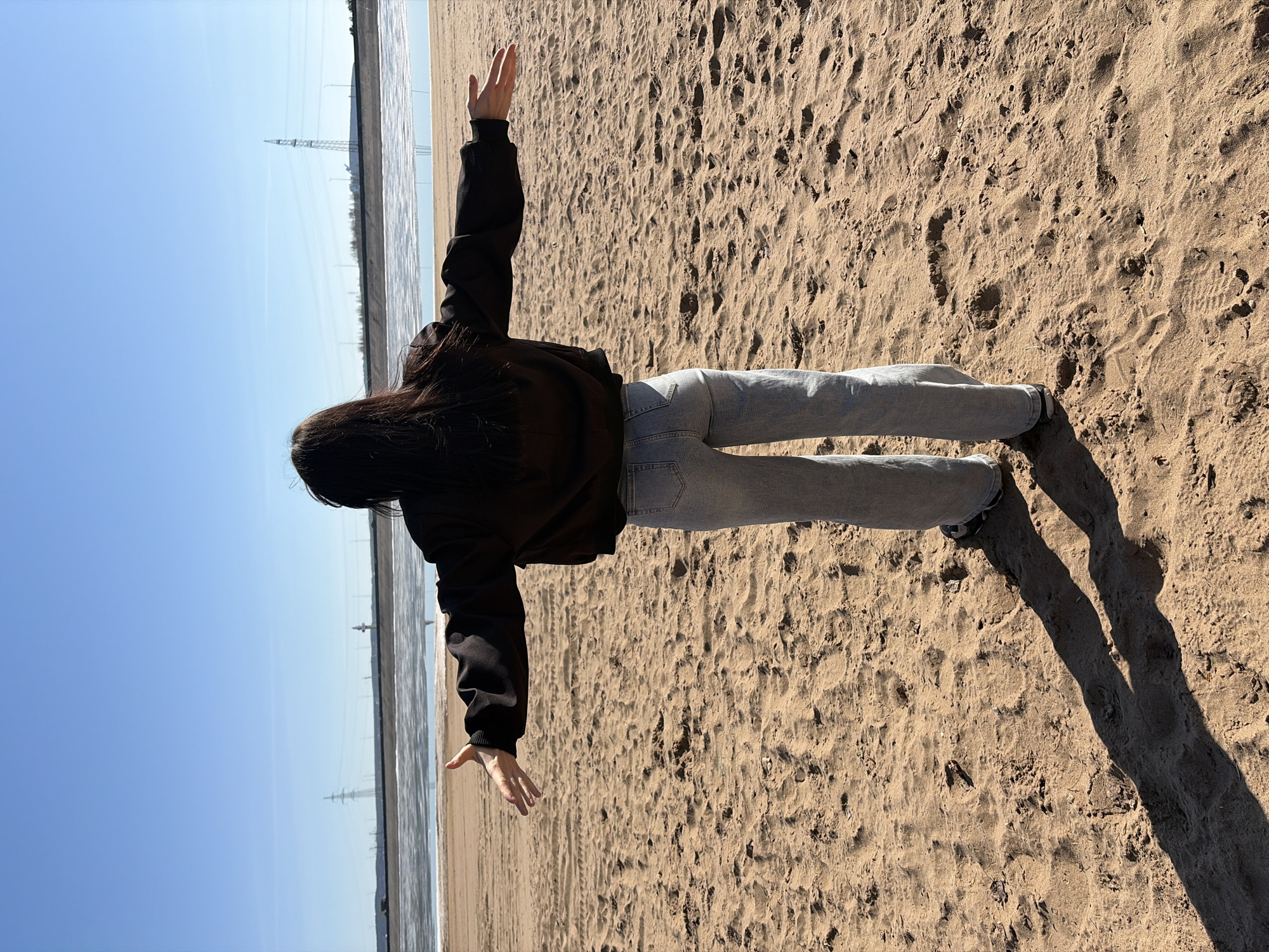 Beach day documented in Noviy, Russia with photography and sand art