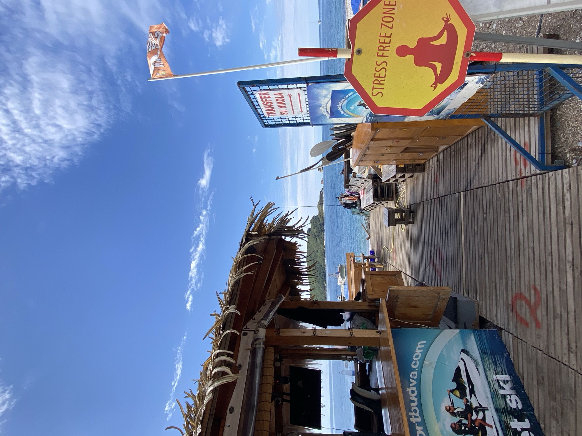 Morning leisure moments captured at Budva beachside bar and garden