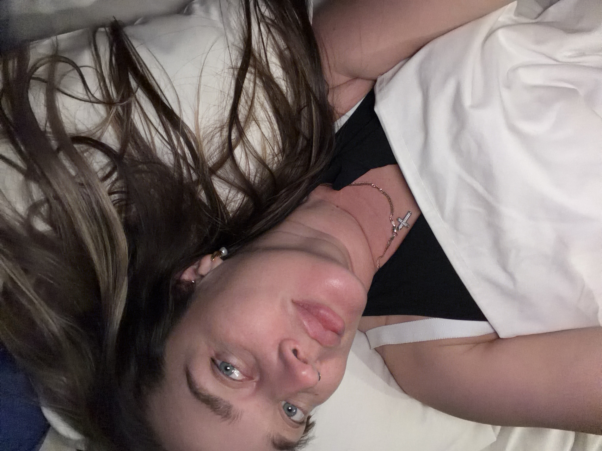 Person photographed in bed in Moscow