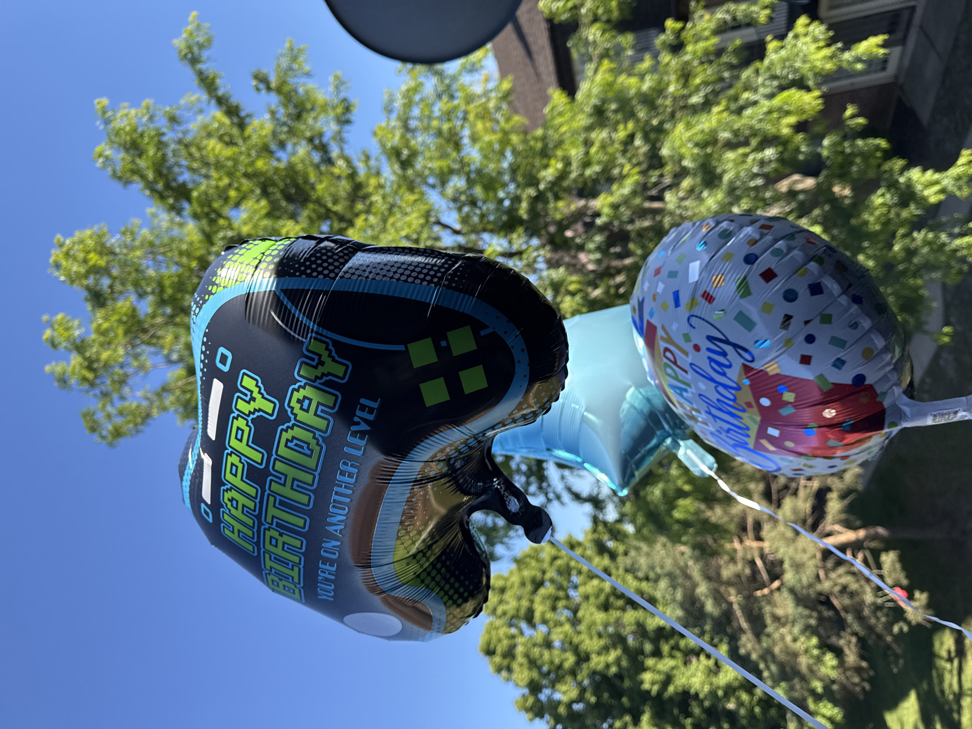 Celebratory balloons spotted in clear skies over Glendale Heights