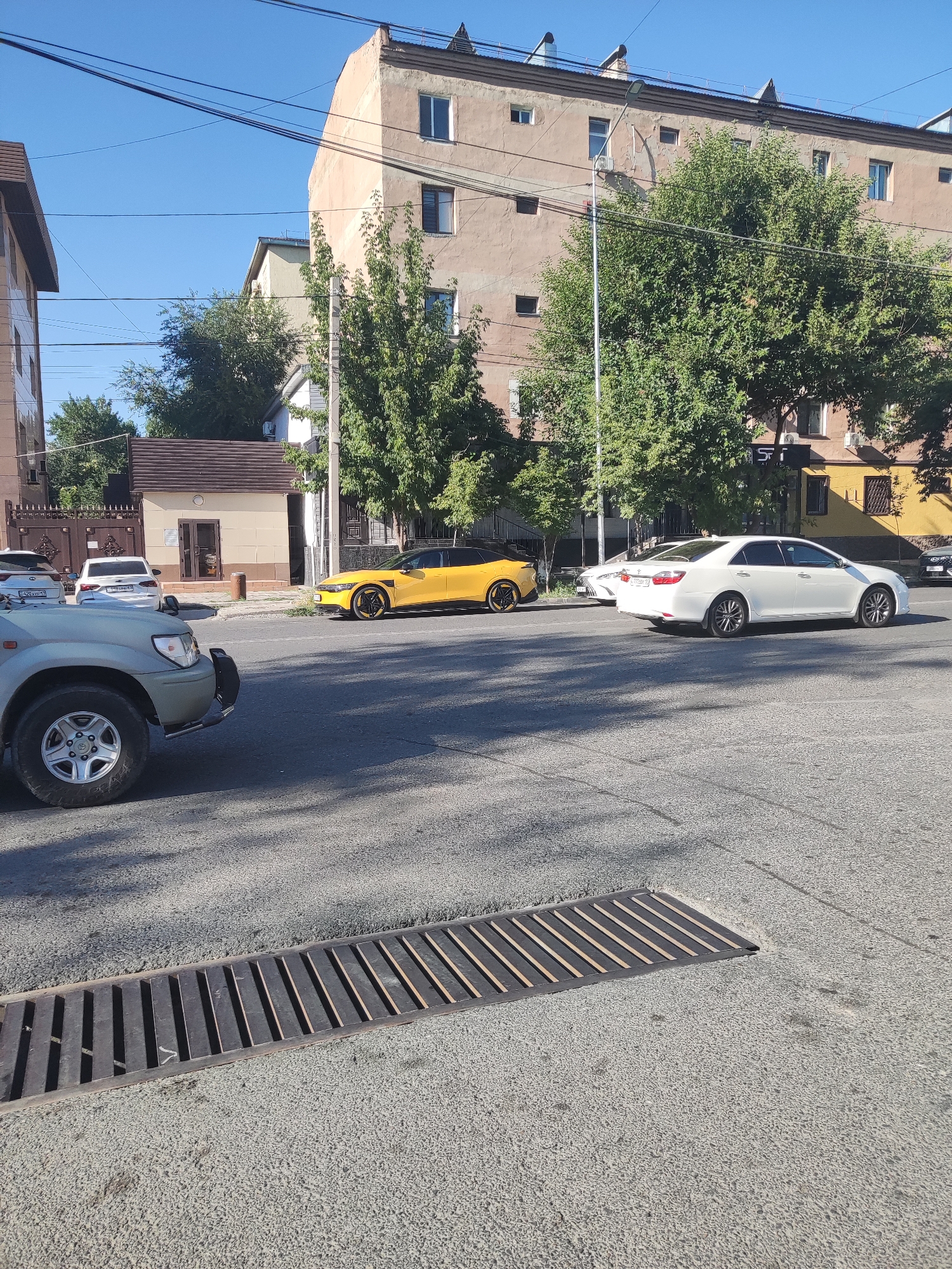 Sunny afternoon street scene in Shymkent, Kazakhstan