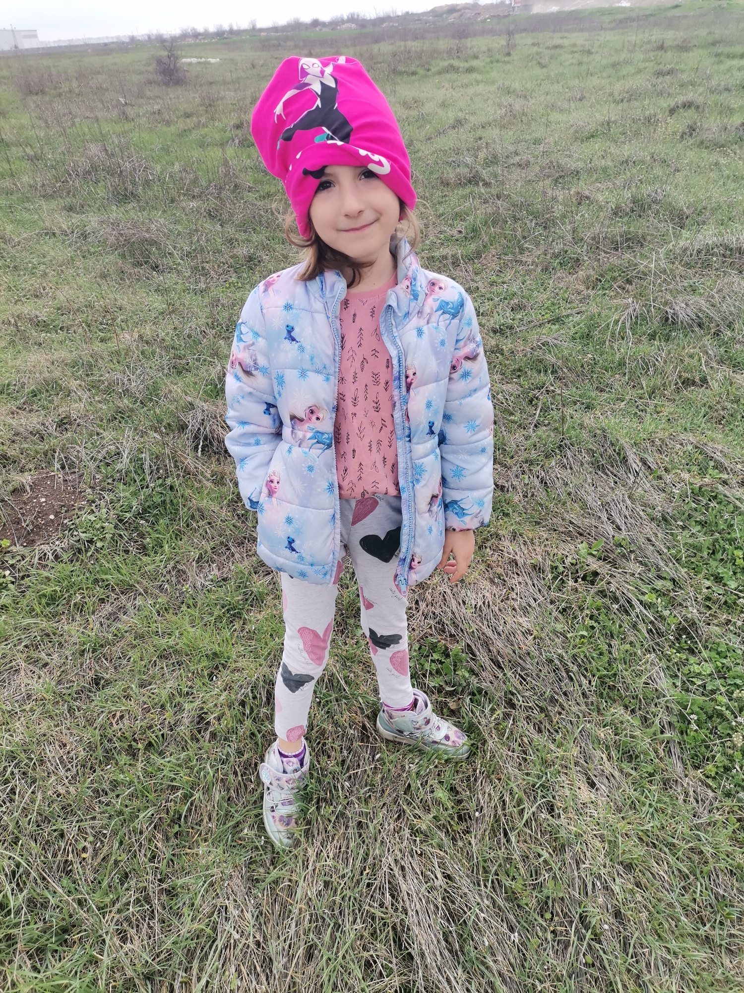 Child in superhero hat spotted in Bulgarian field