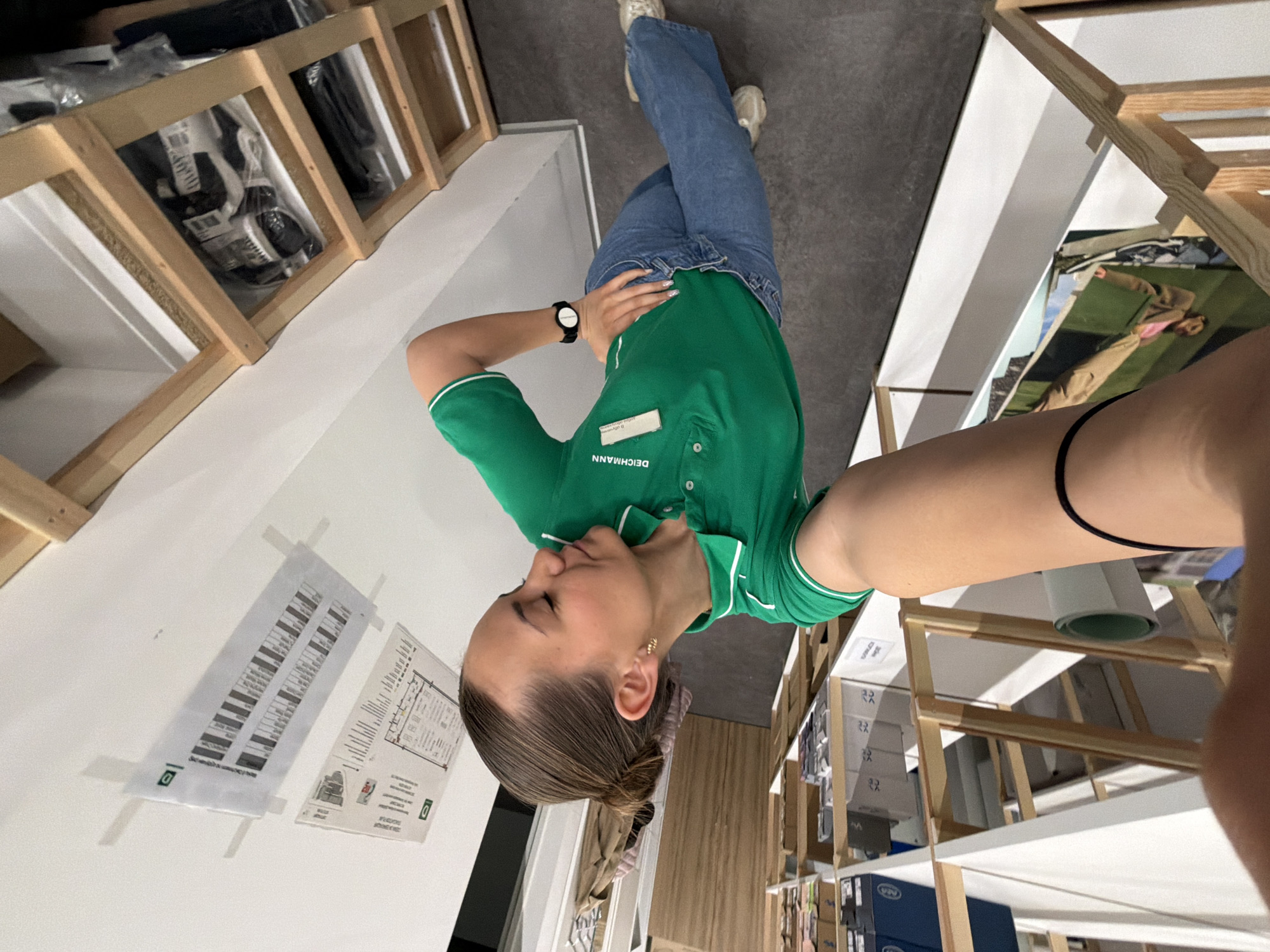 Employee takes selfies at DEICHMANN shoe store in Sofia
