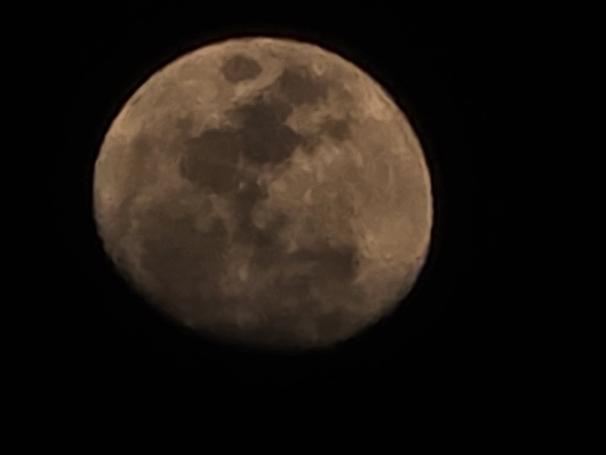 Moon close-up shows craters and maria over Paris skies