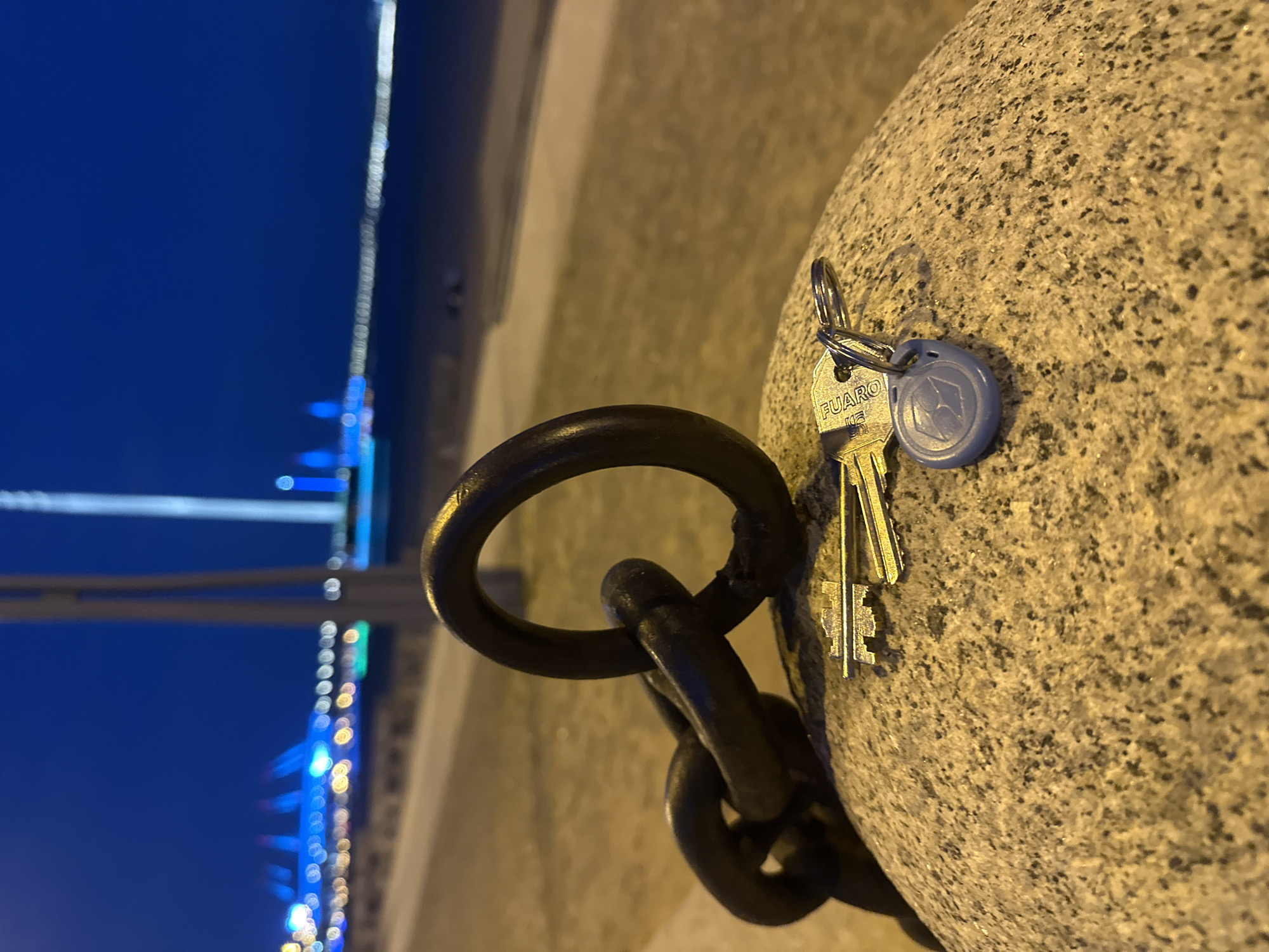 FUARO keys and a chain on a stone surface in Lednevo
