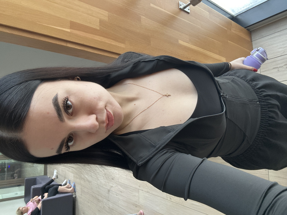 Woman documents workout routine at Saint Petersburg fitness center