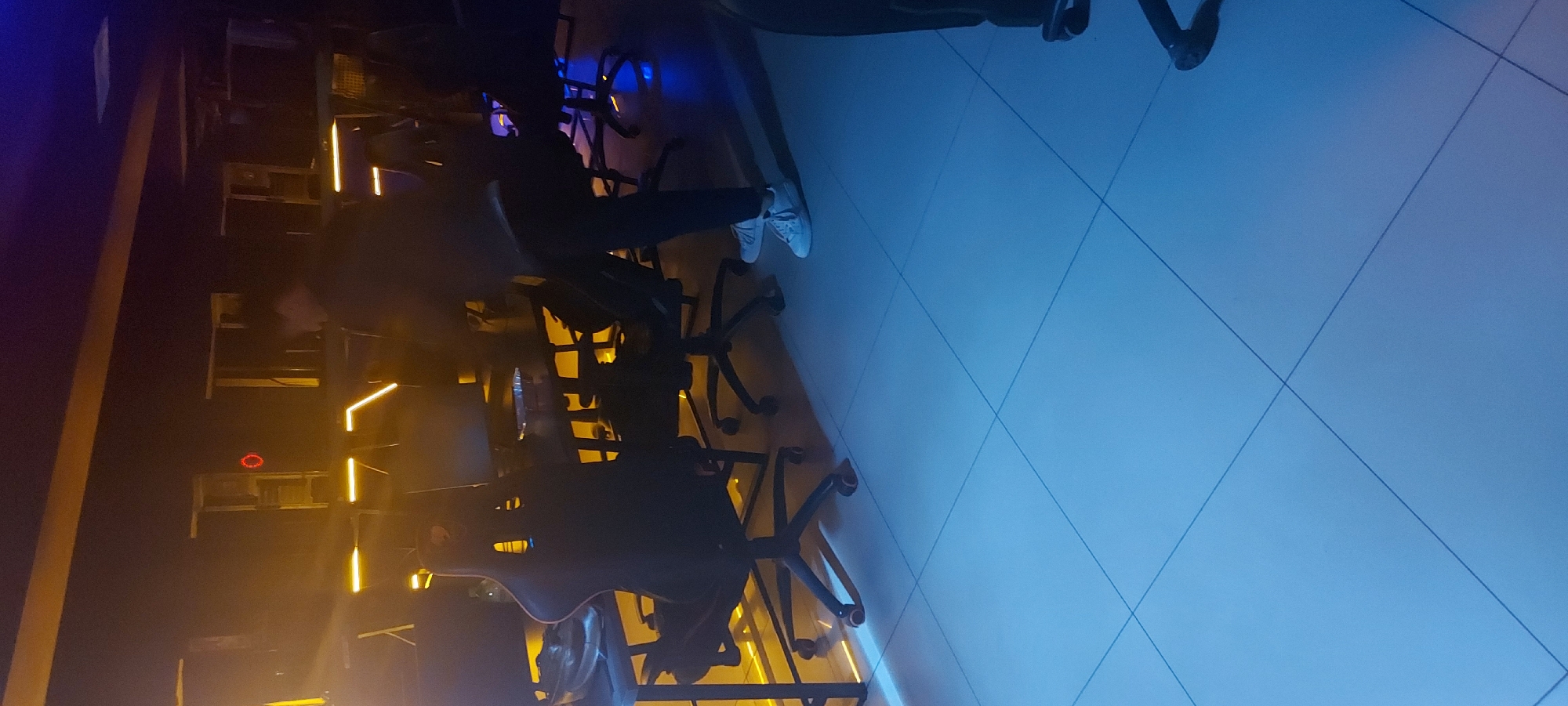 People gather at internet cafe in Tashkent