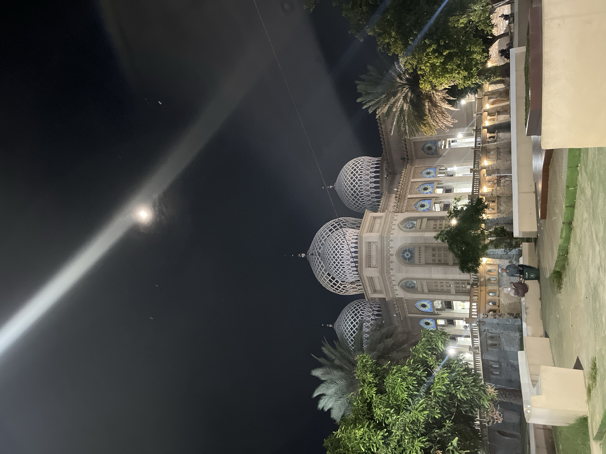 Baiturrahman Grand Mosque glowing at night in Lhokseumawe