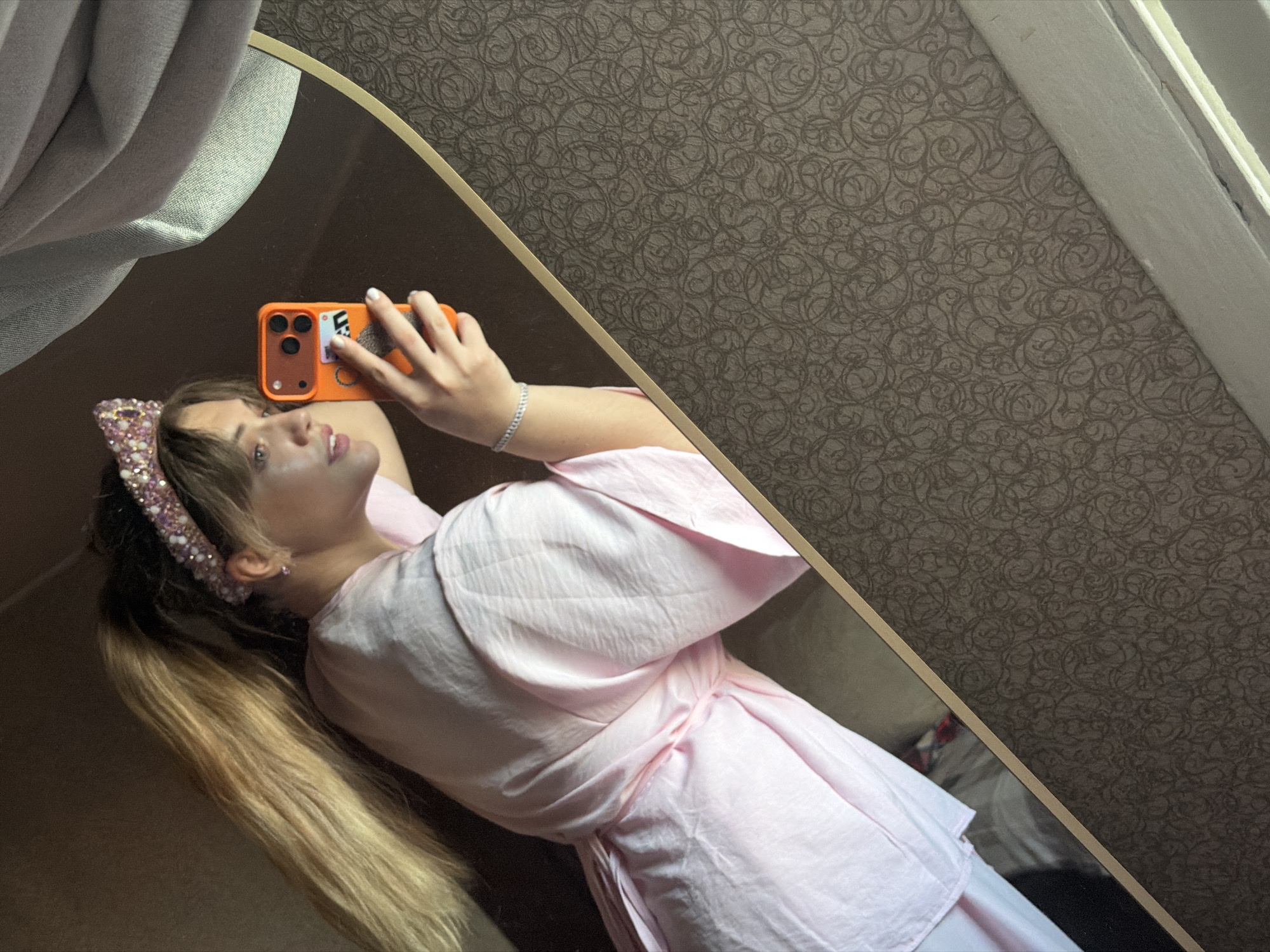 Mirror selfies with pink accessories in Naberezhnye Chelny room
