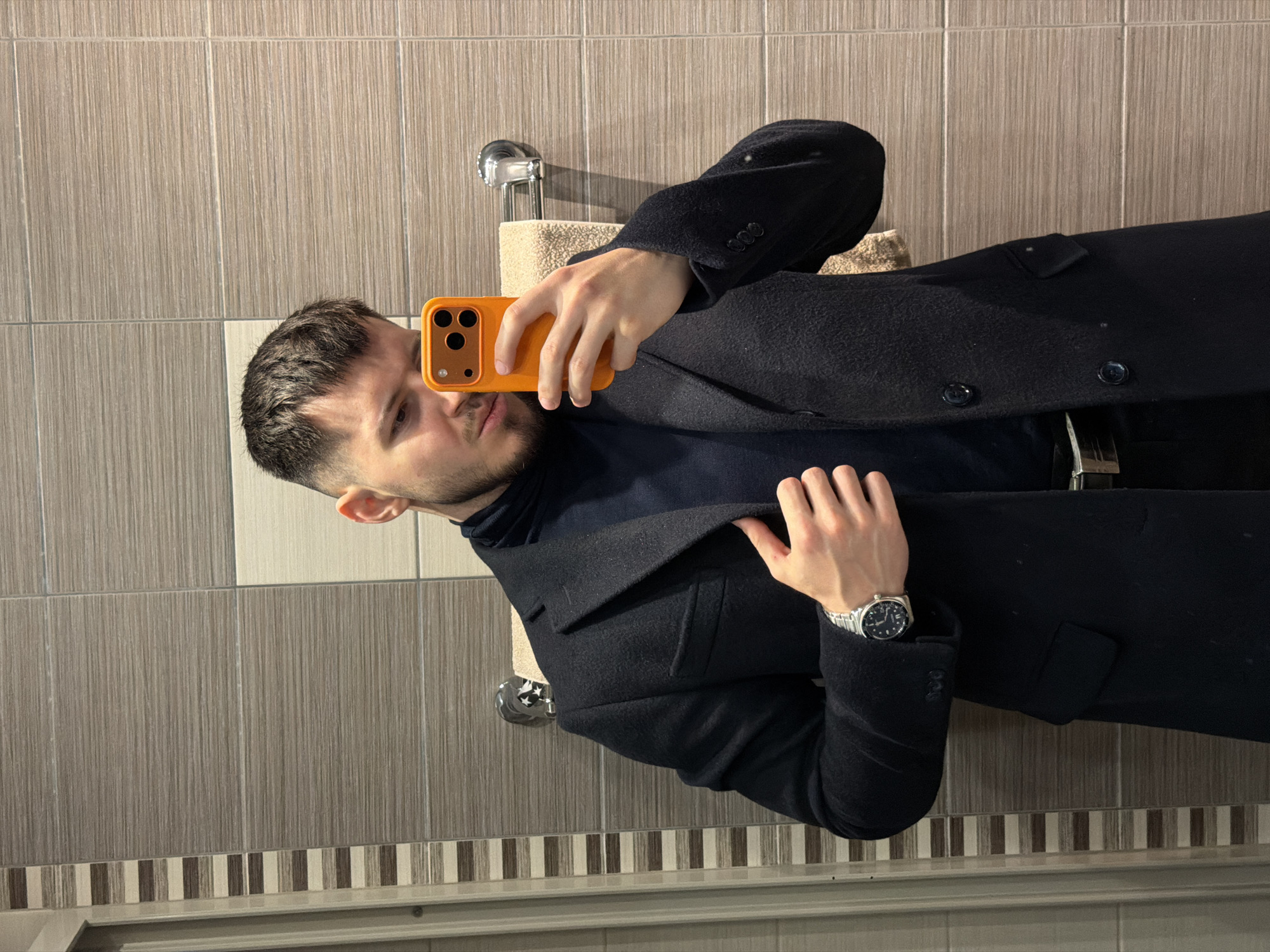 Man takes multiple selfies in Sofia bathroom and elevator