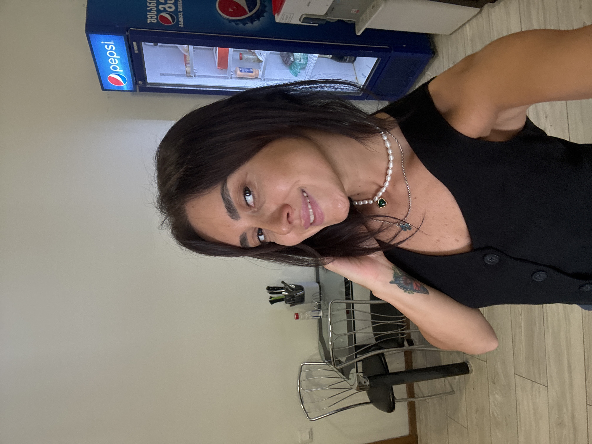 Selfie series from a Tbilisi balcony and apartment, July 2026