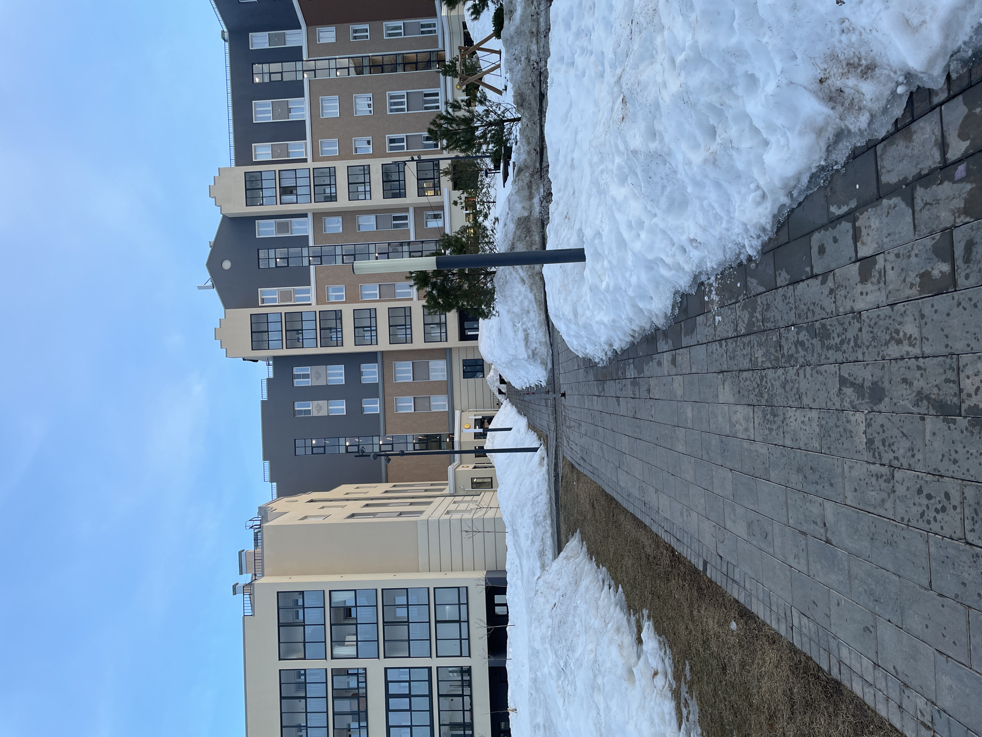 Resident documents casual walk through Pervomaysky district during winter thaw
