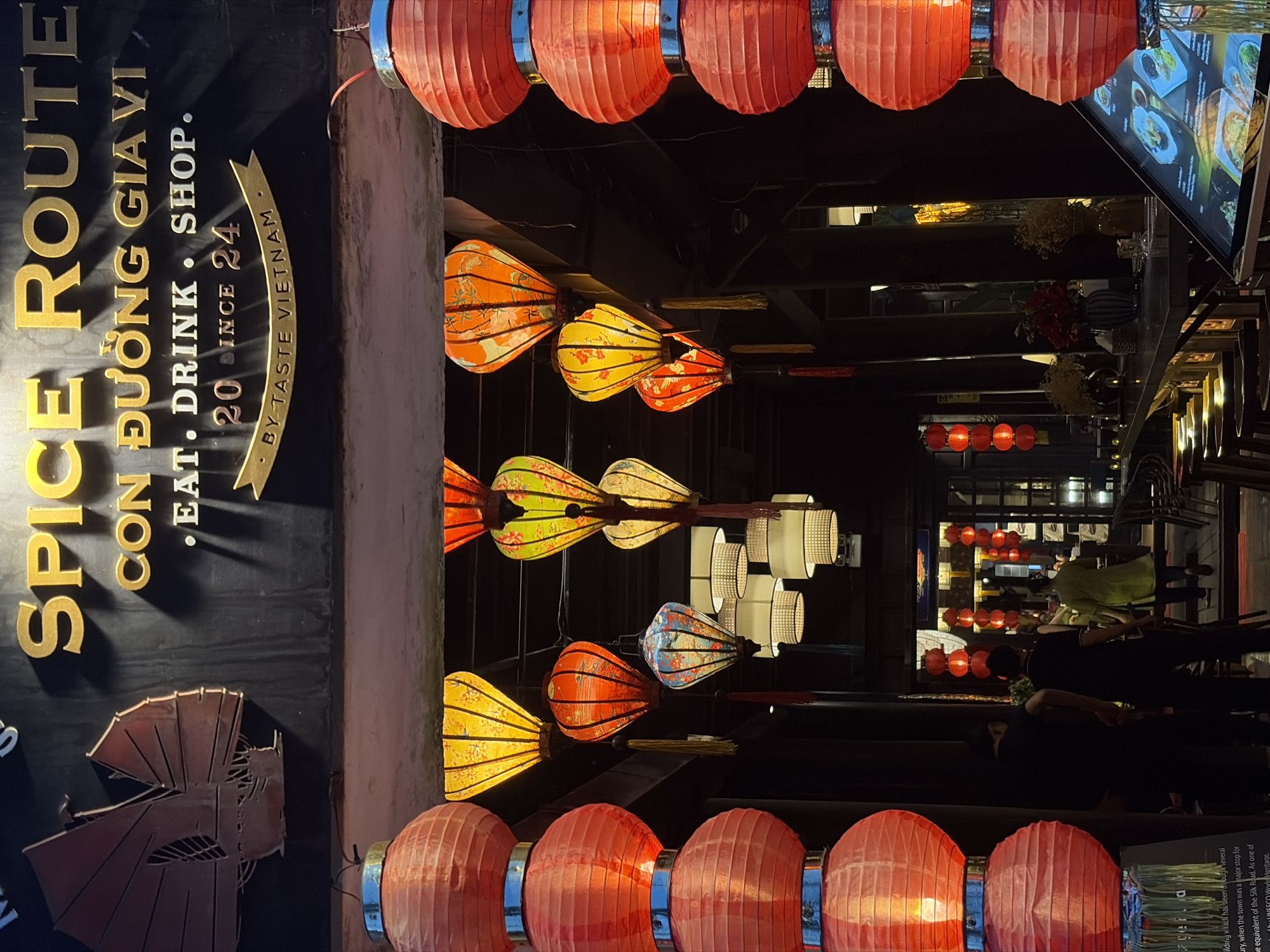 Family enjoys evening lantern festival atmosphere in historic Hội An