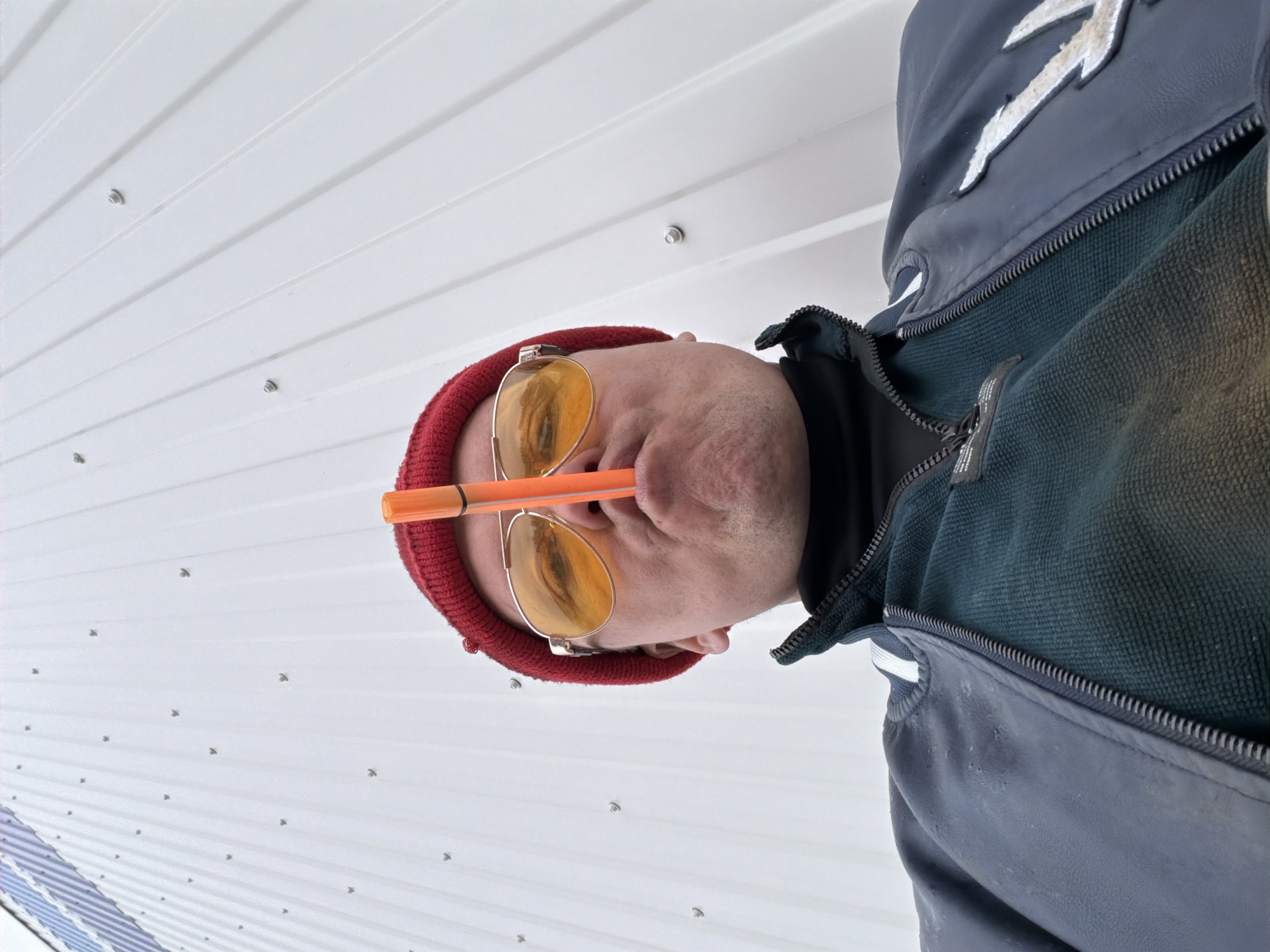 Person in red cap documented around Chaikovsky industrial areas