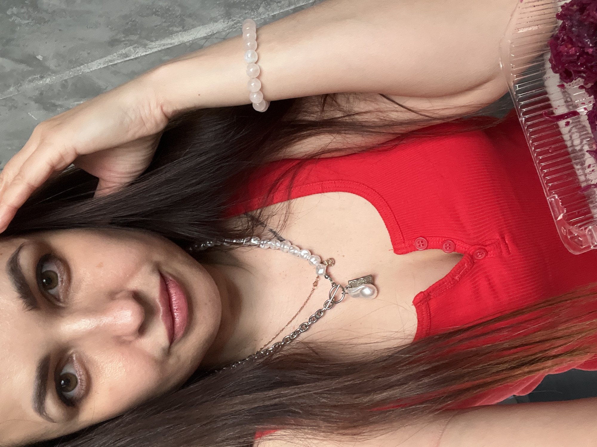 Woman documents morning journey through selfies in car, entertainment venue