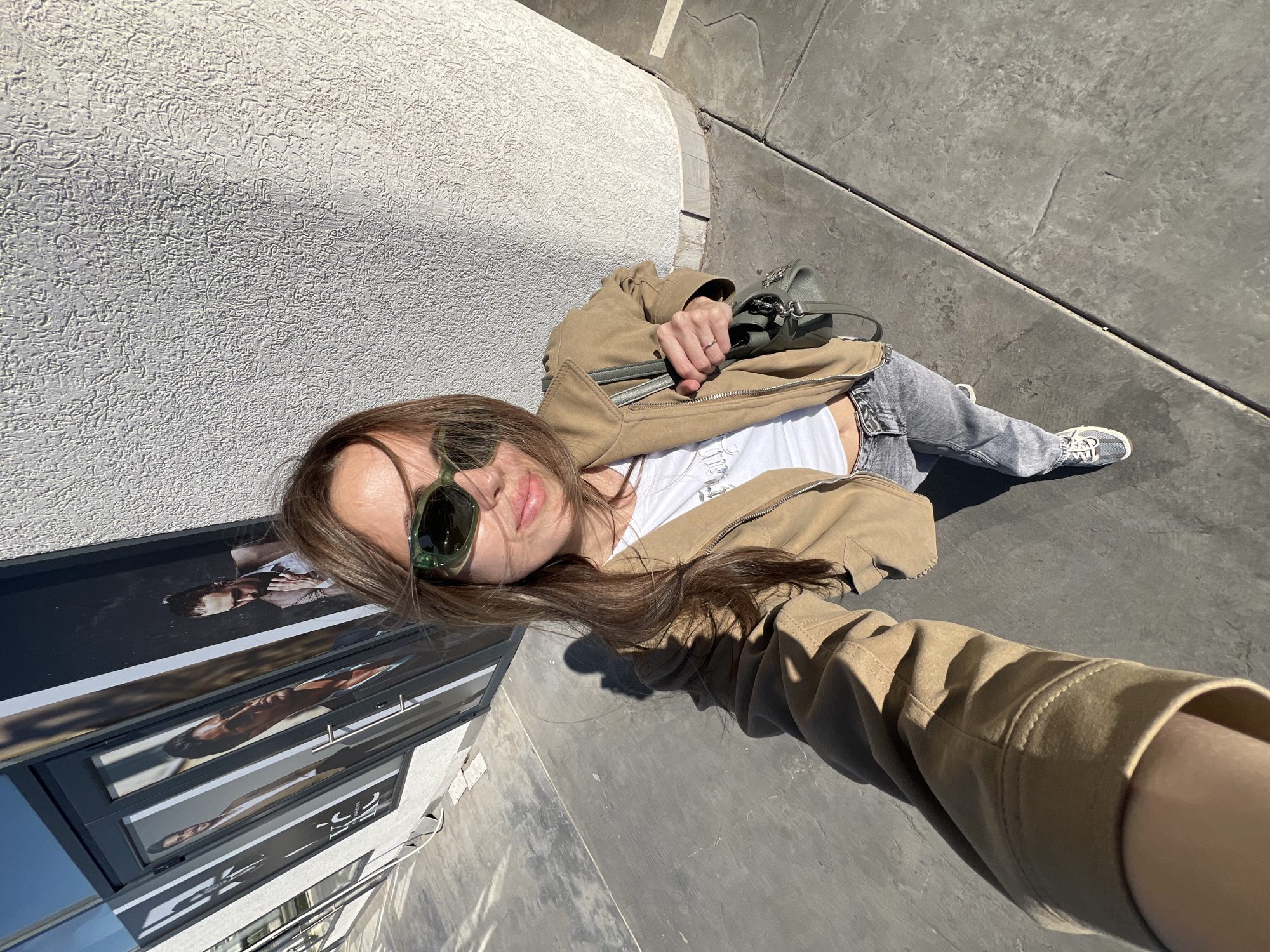 Woman Takes Selfie on Street in Bjeliši, Montenegro